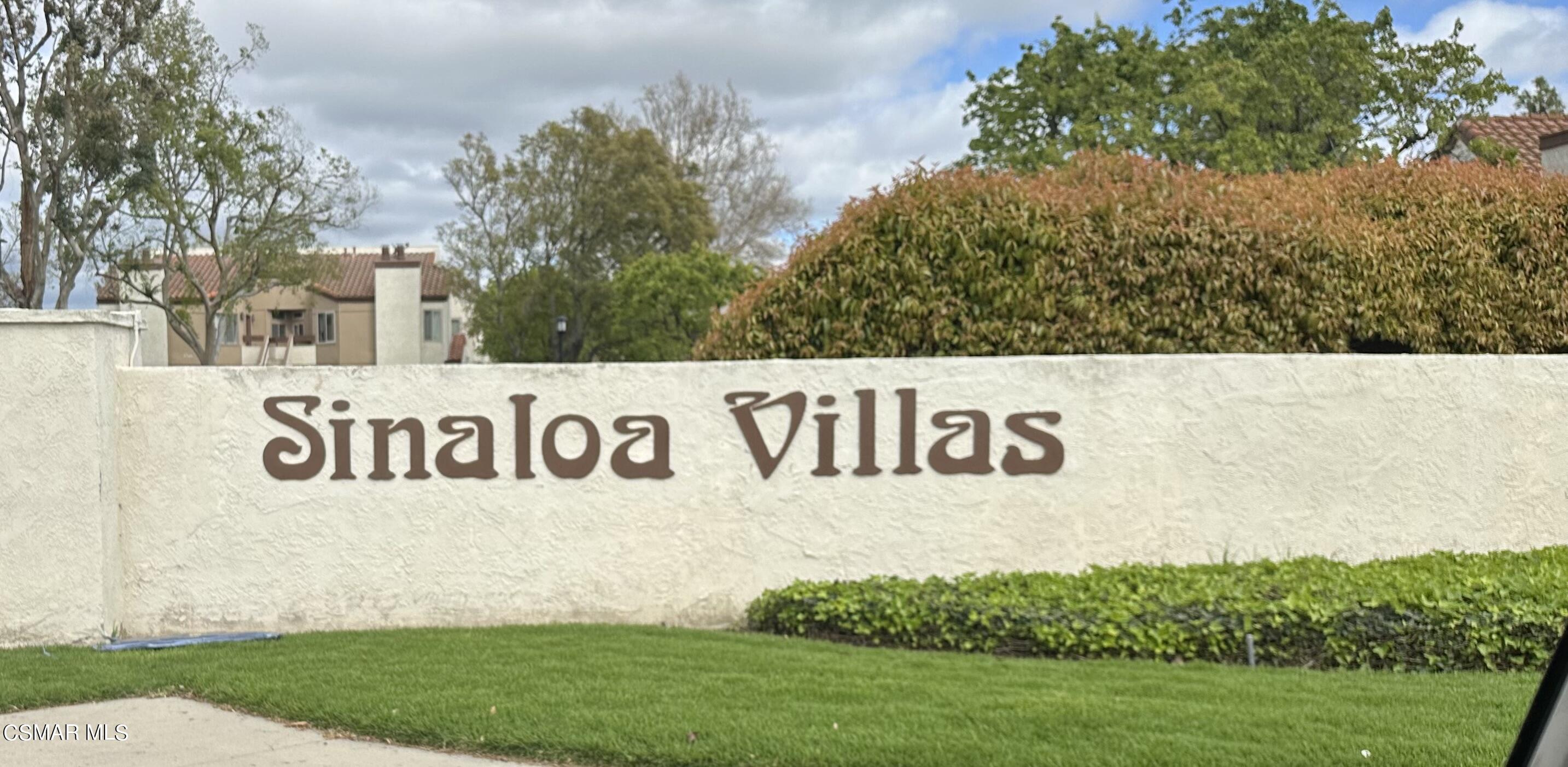 1760 Sinaloa Road, Unit 167 Simi Valley, CA 93065 - Photo 2 of 8 a sign broad in front of a white house