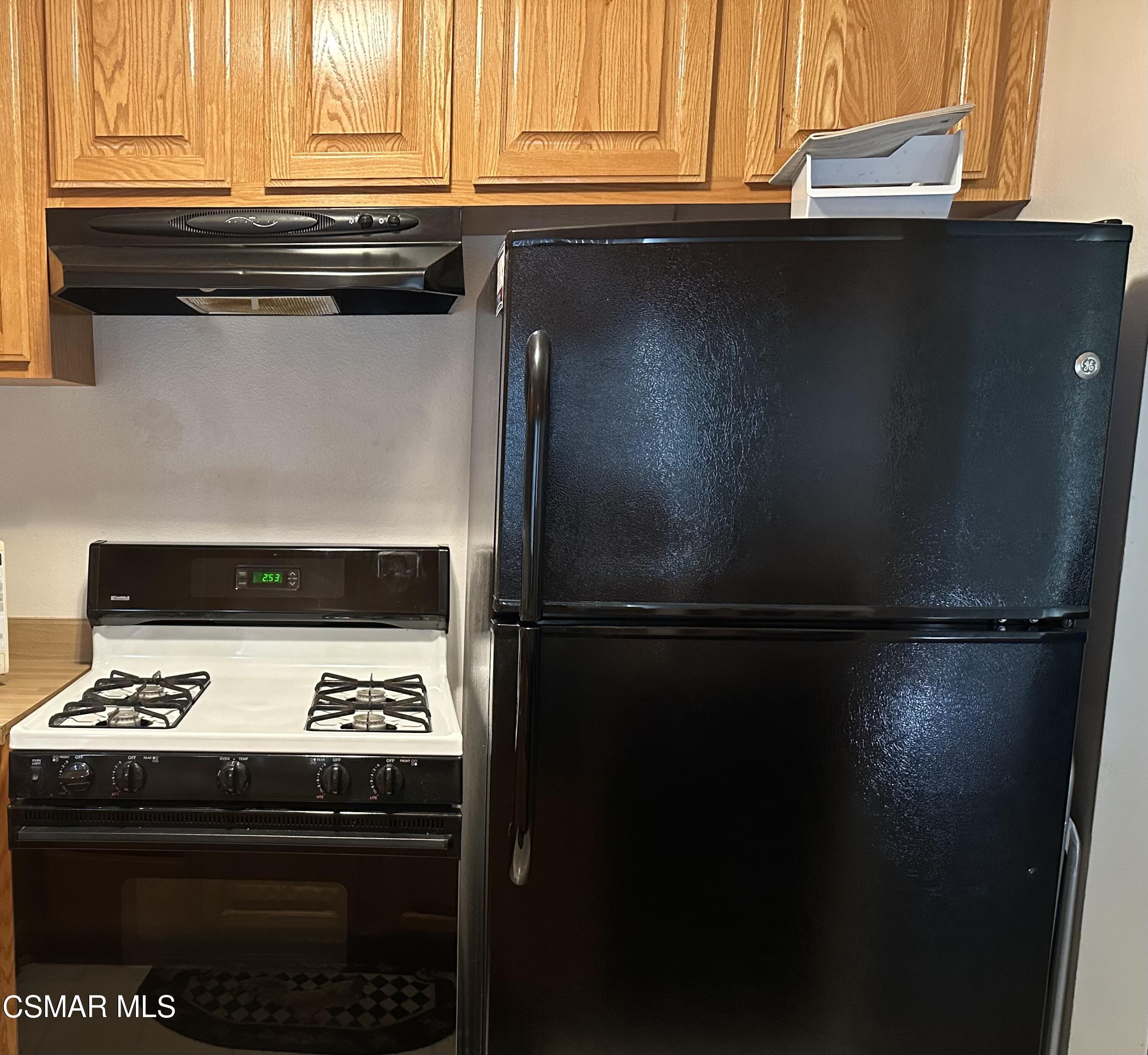 1760 Sinaloa Road, Unit 167 Simi Valley, CA 93065 - Photo 8 of 8 a close view of a stove top oven sitting inside of a kitchen