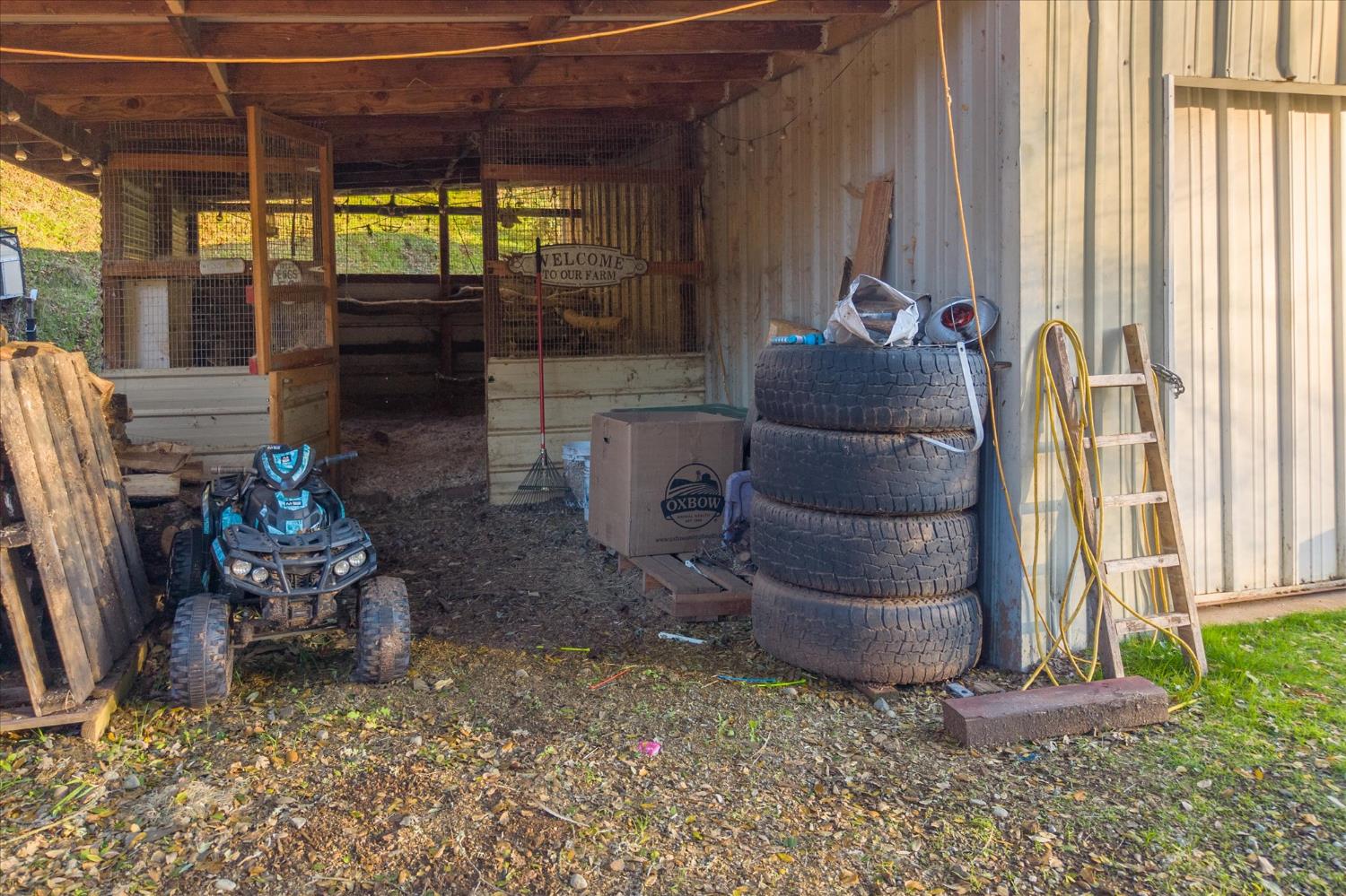 8653 Hidden Valley Road Mountain Ranch, CA 95246 - Photo 34 of 41 a room with furniture and a window