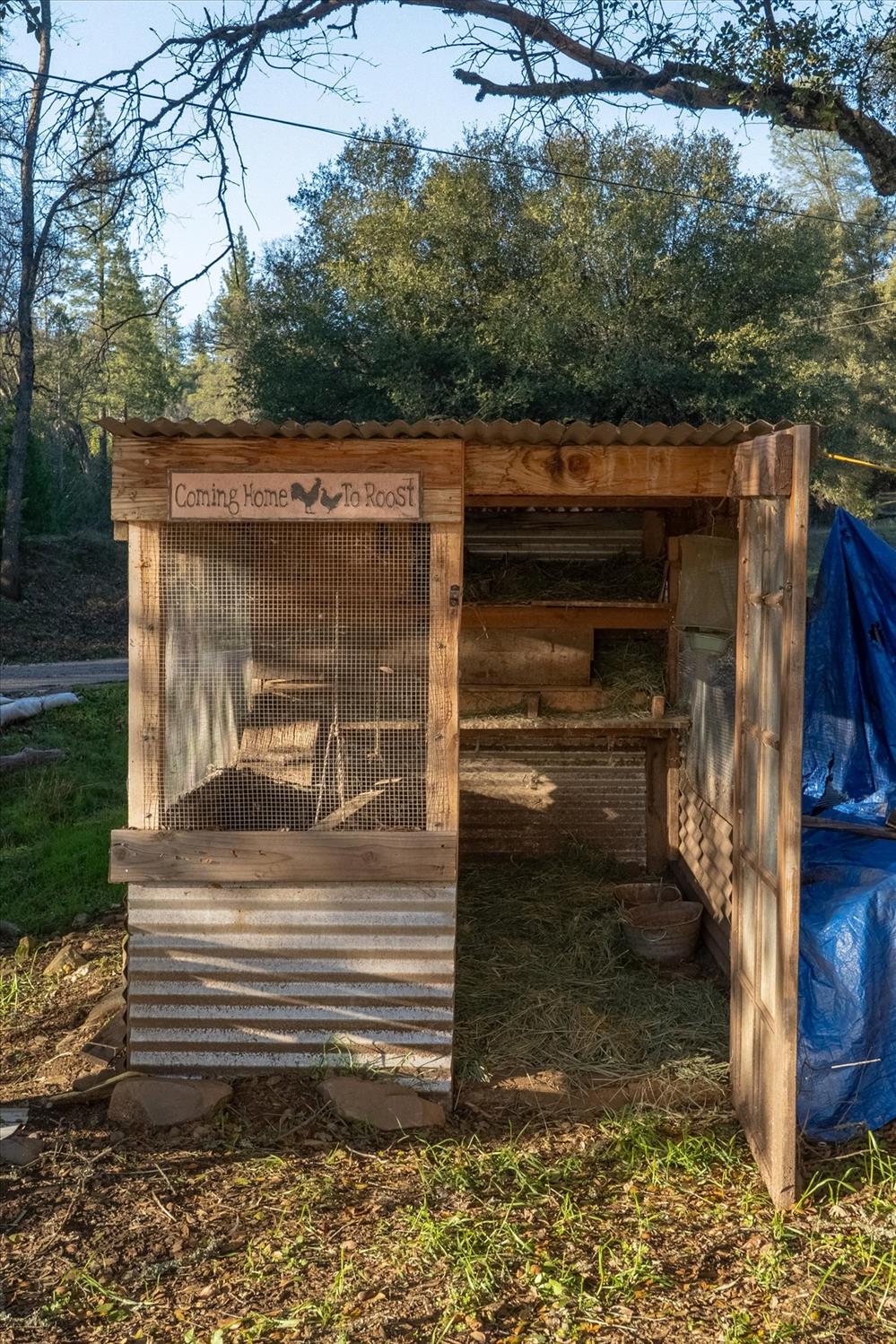 8653 Hidden Valley Road Mountain Ranch, CA 95246 - Photo 35 of 41 a view of a entrance gate of the house