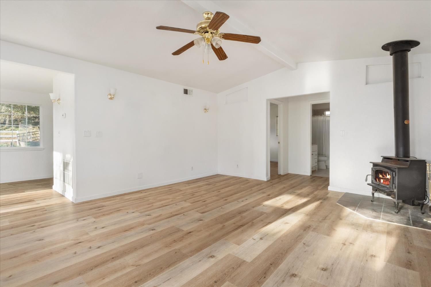8653 Hidden Valley Road Mountain Ranch, CA 95246 - Photo 5 of 41 a view of empty room with wooden floor