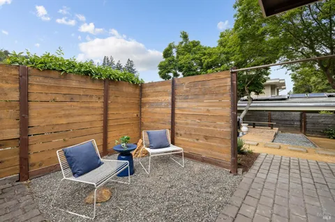 a view of a outdoor seating area with furniture