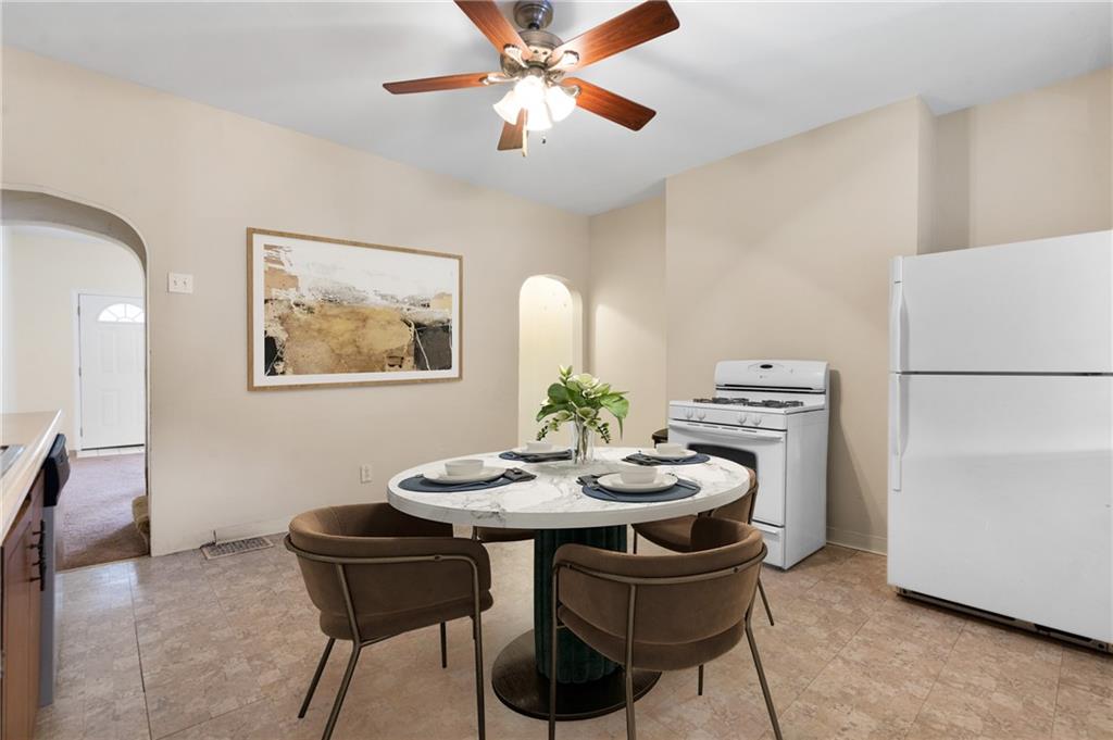 316 Stanton Pittsburgh, PA 15209 - Photo 12 of 32 a dining room with furniture and window