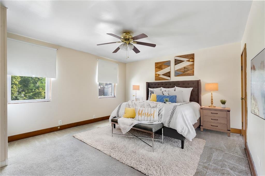 316 Stanton Pittsburgh, PA 15209 - Photo 16 of 32 a bedroom with a bed and window