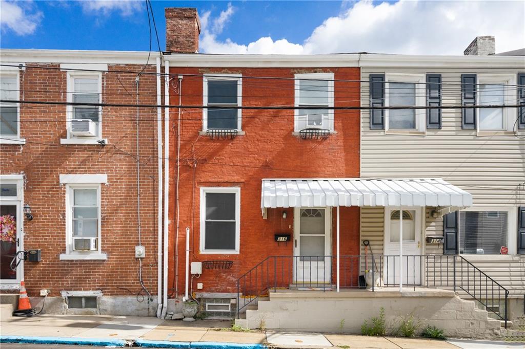 316 Stanton Pittsburgh, PA 15209 - Photo 2 of 32 front view of a building