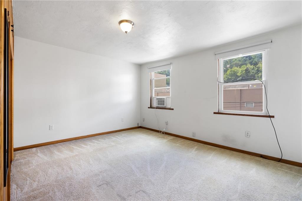316 Stanton Pittsburgh, PA 15209 - Photo 21 of 32 an empty room with windows
