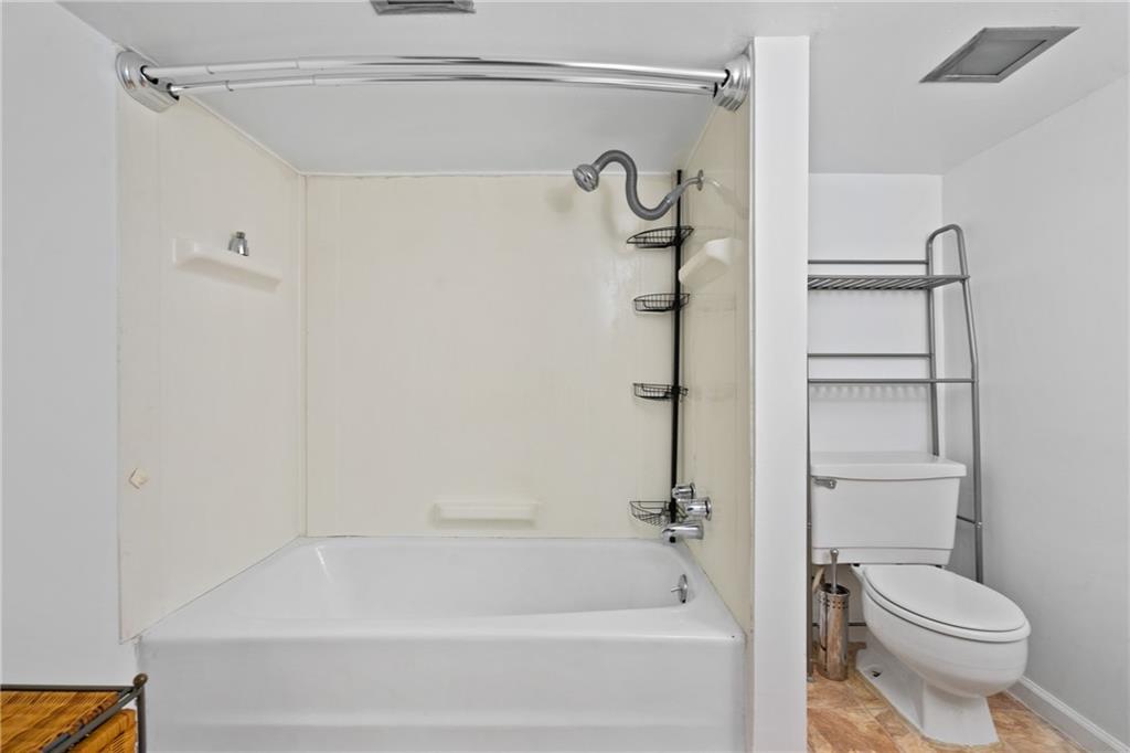 316 Stanton Pittsburgh, PA 15209 - Photo 25 of 32 a bathroom with a bathtub and a shower