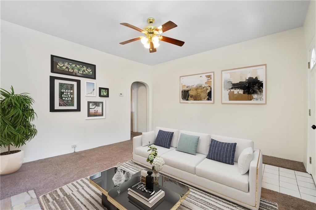 316 Stanton Pittsburgh, PA 15209 - Photo 6 of 32 a living room with furniture and a potted plant