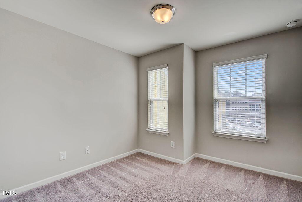 529 Metro Station Apex, NC 27502 - Photo 27 of 28 an empty room with windows