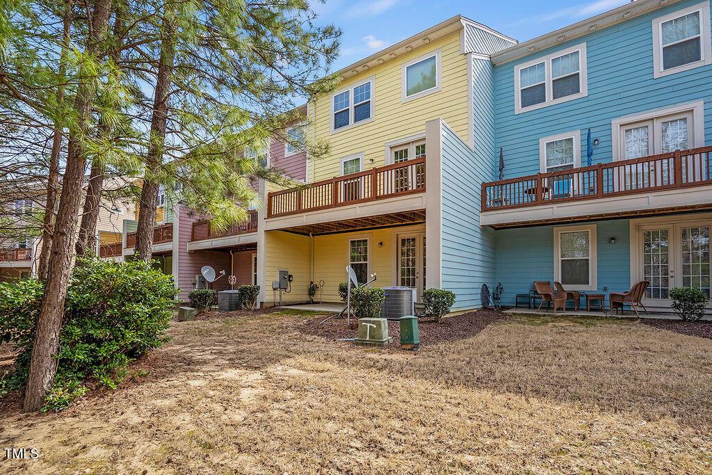 529 Metro Station Apex, NC 27502 - Photo 5 of 28 a front view of a building with many windows