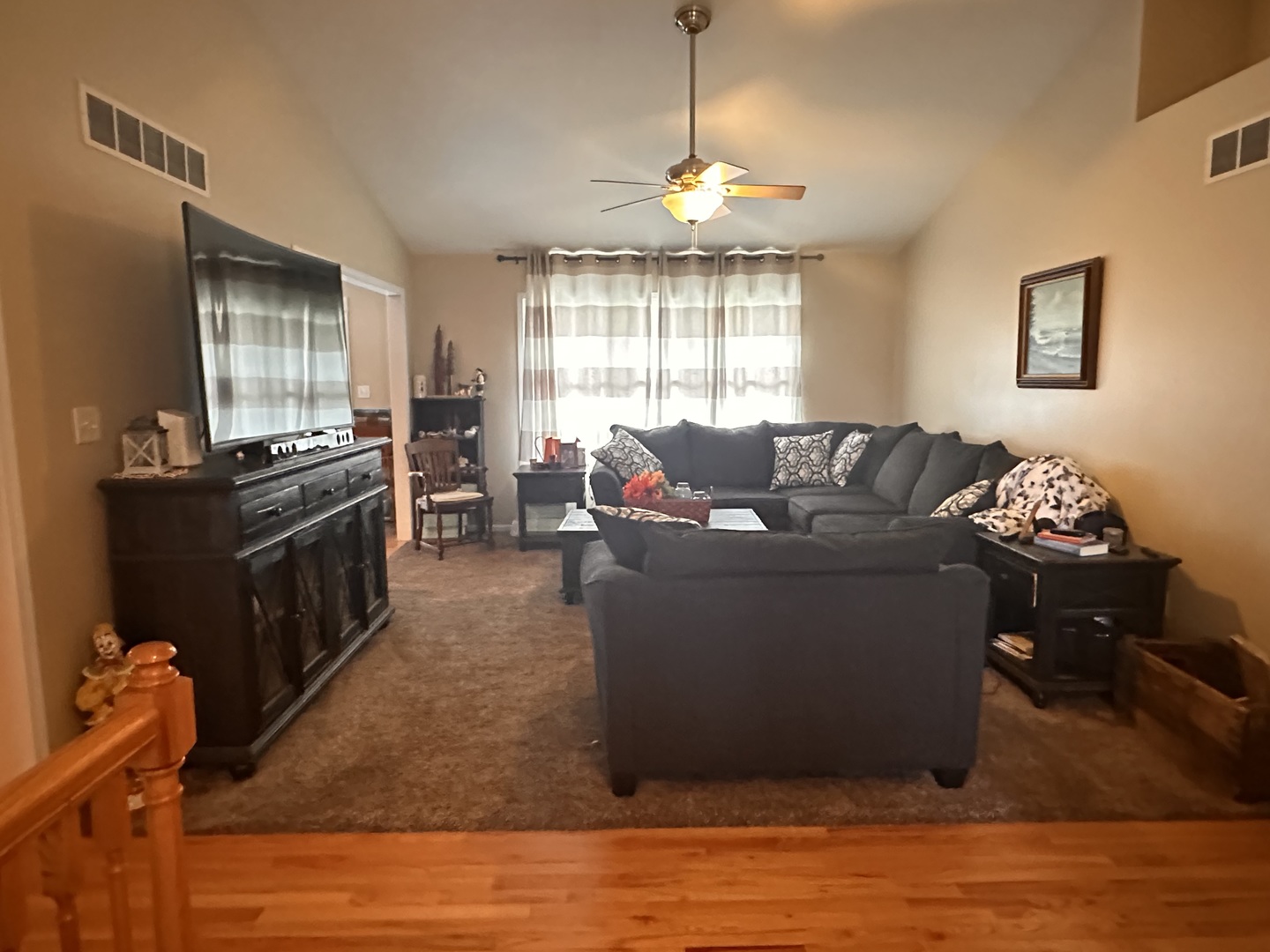 311 Lake Lida Lane Rochelle, IL 61068 - Photo 6 of 33 a living room with furniture and a chandelier