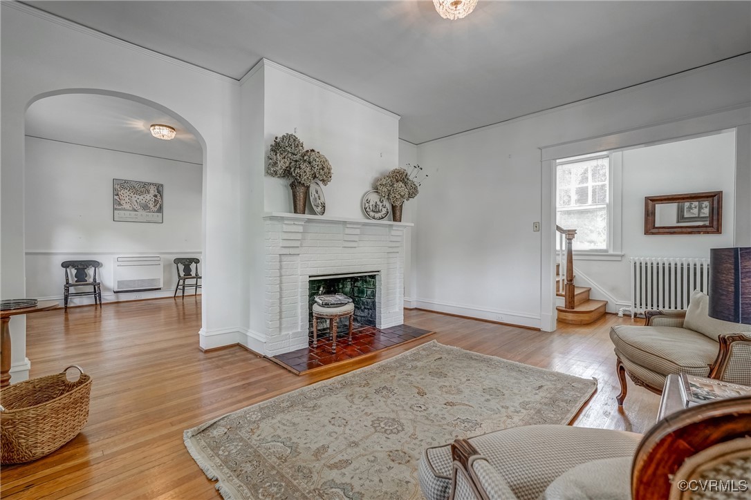 4101 Crestwood Road Richmond, VA 23227 - Photo 13 of 48 a living room with furniture and a fireplace
