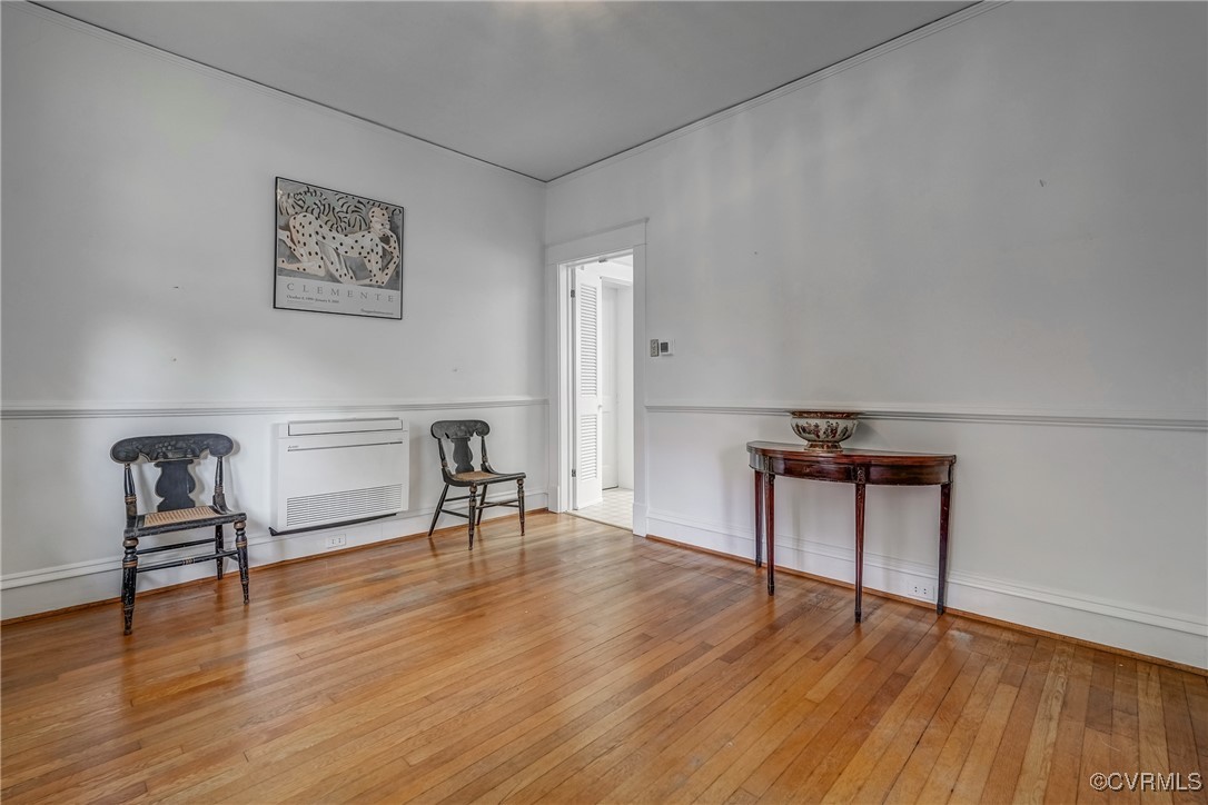 4101 Crestwood Road Richmond, VA 23227 - Photo 23 of 48 a living room with furniture and a wooden floor