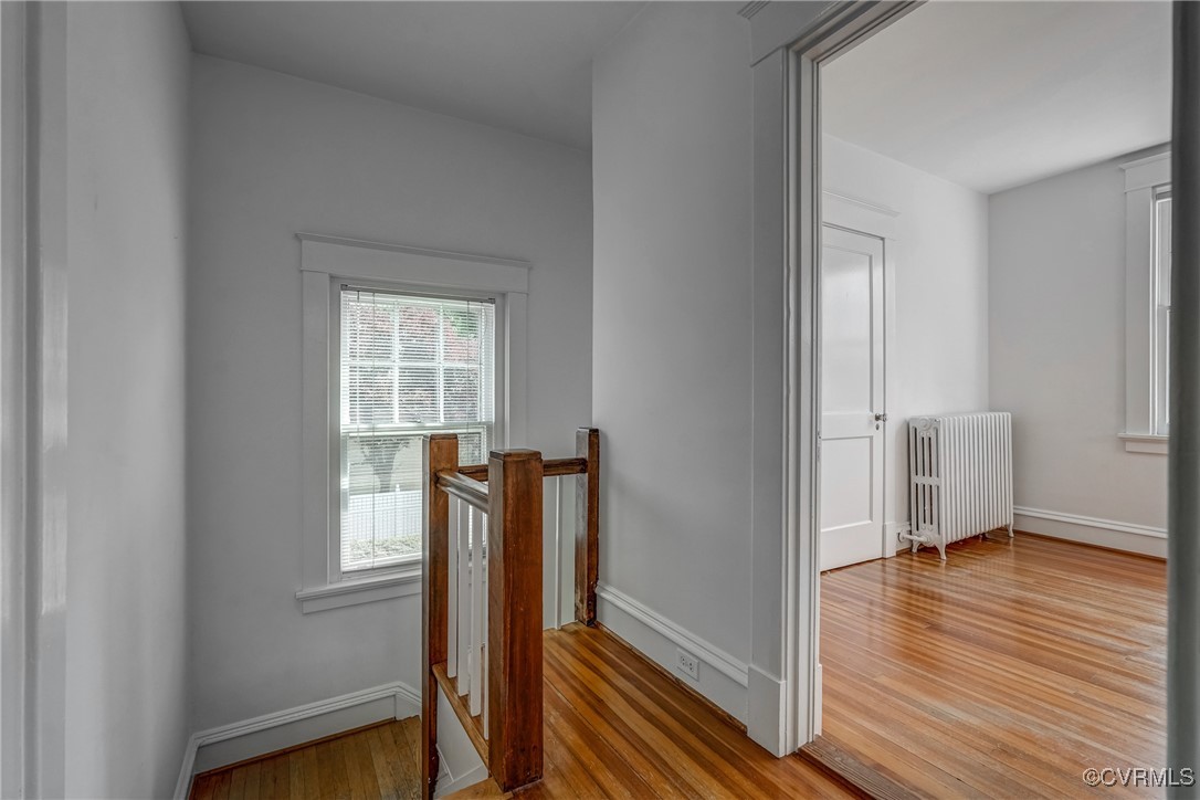 4101 Crestwood Road Richmond, VA 23227 - Photo 27 of 48 a view of an empty room with wooden floor and a window