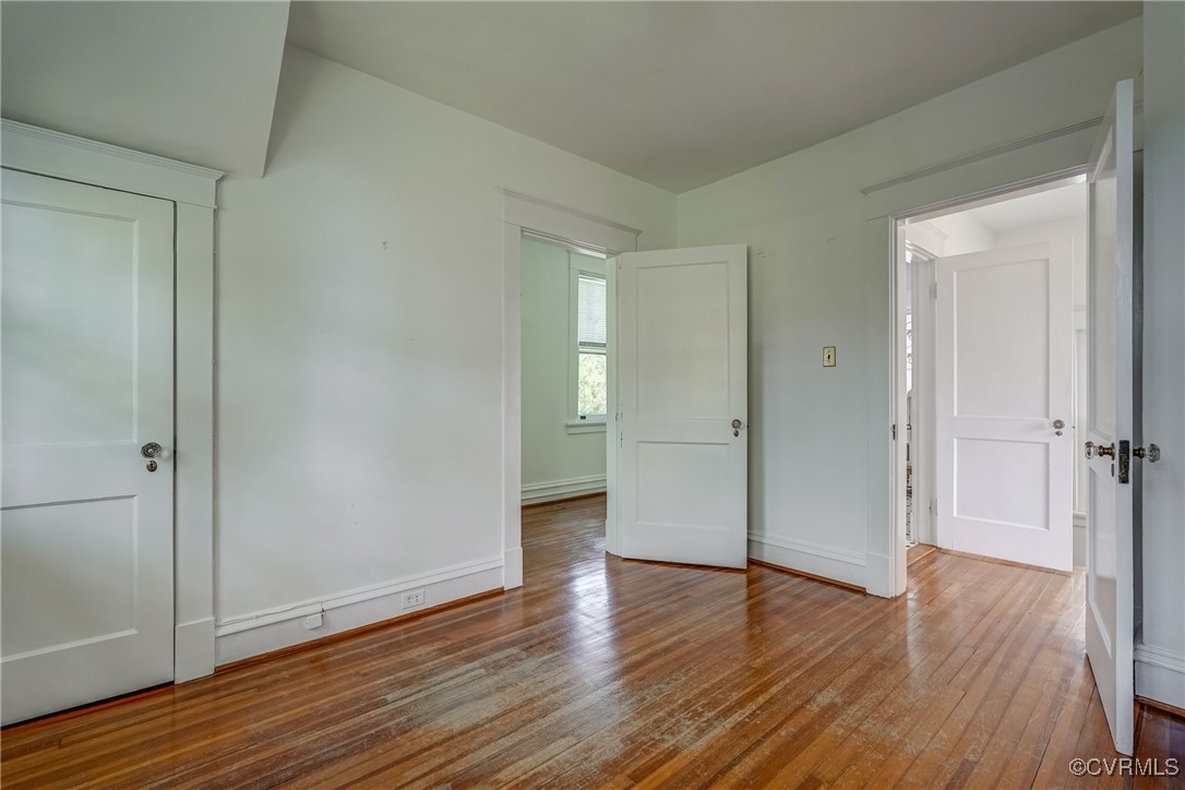 4101 Crestwood Road Richmond, VA 23227 - Photo 34 of 48 a view of empty room with wooden floor