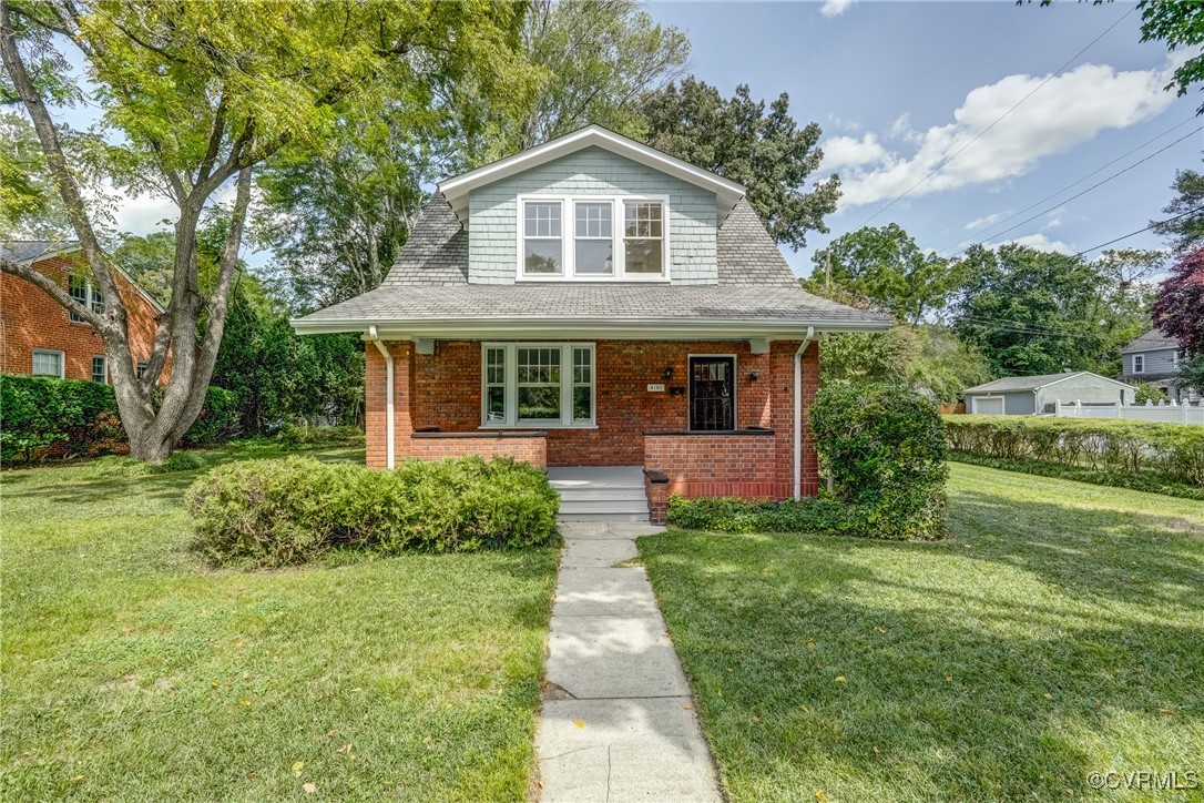 4101 Crestwood Road Richmond, VA 23227 - Photo 4 of 48 a front view of a house with garden