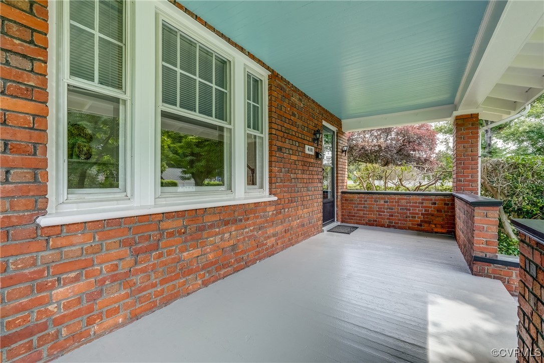 4101 Crestwood Road Richmond, VA 23227 - Photo 7 of 48 a view of a porch with wooden floor and outdoor space