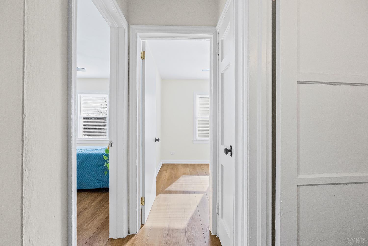 1209 Shirley Road Lynchburg, VA 24502 - Photo 13 of 27 a view of a bathroom from a corridor