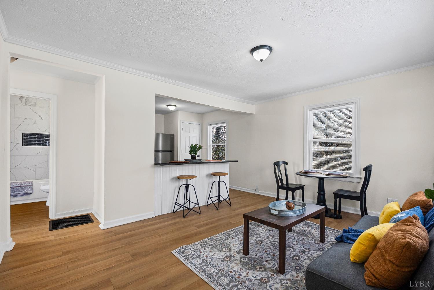 1209 Shirley Road Lynchburg, VA 24502 - Photo 4 of 27 a living room with furniture wooden floor and a window