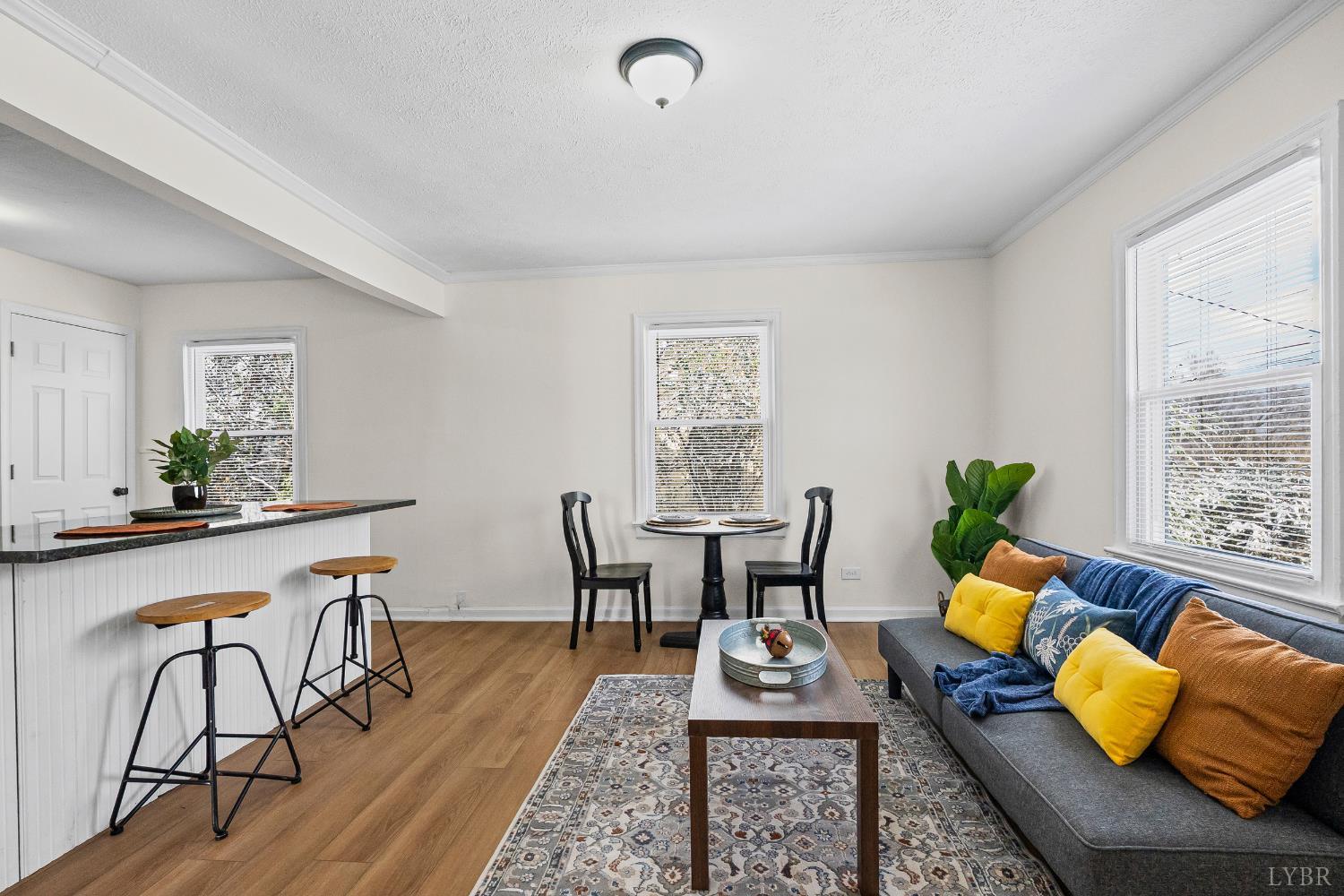 1209 Shirley Road Lynchburg, VA 24502 - Photo 5 of 27 a living room with furniture and wooden floor