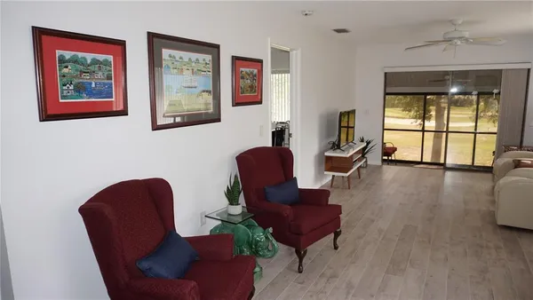 a living room with furniture and a window