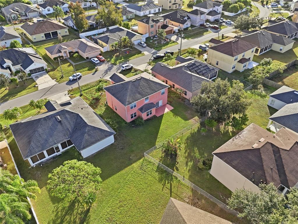 547 Brighton Court Kissimmee, FL 34758 - Photo 36 of 36 an aerial view of residential houses with outdoor space