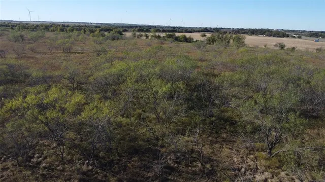 a view of a bathroom next to a lake