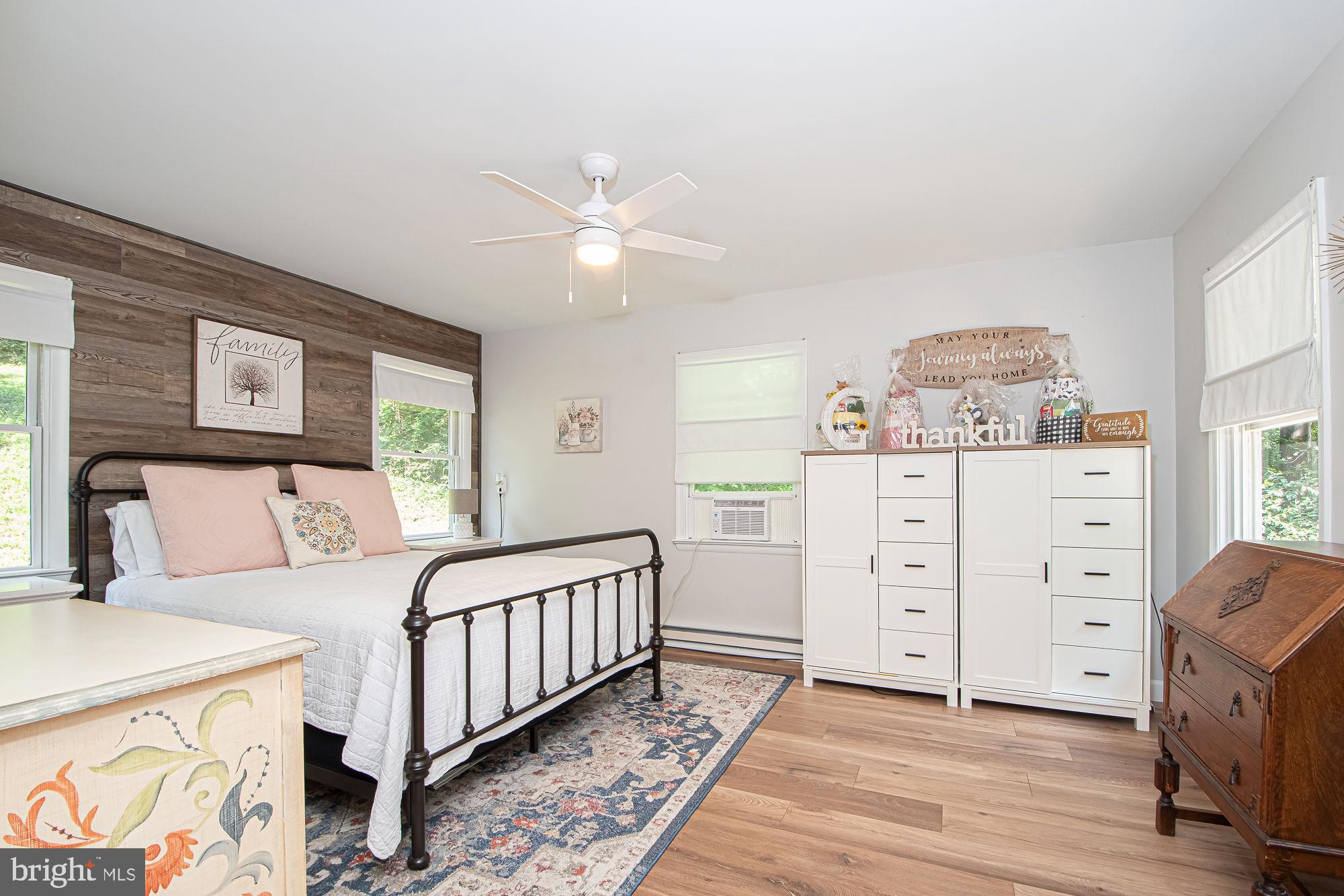 61 Mt Marshall Road Washington, VA 22747 - Photo 29 of 54 a bedroom with a bed and a dresser