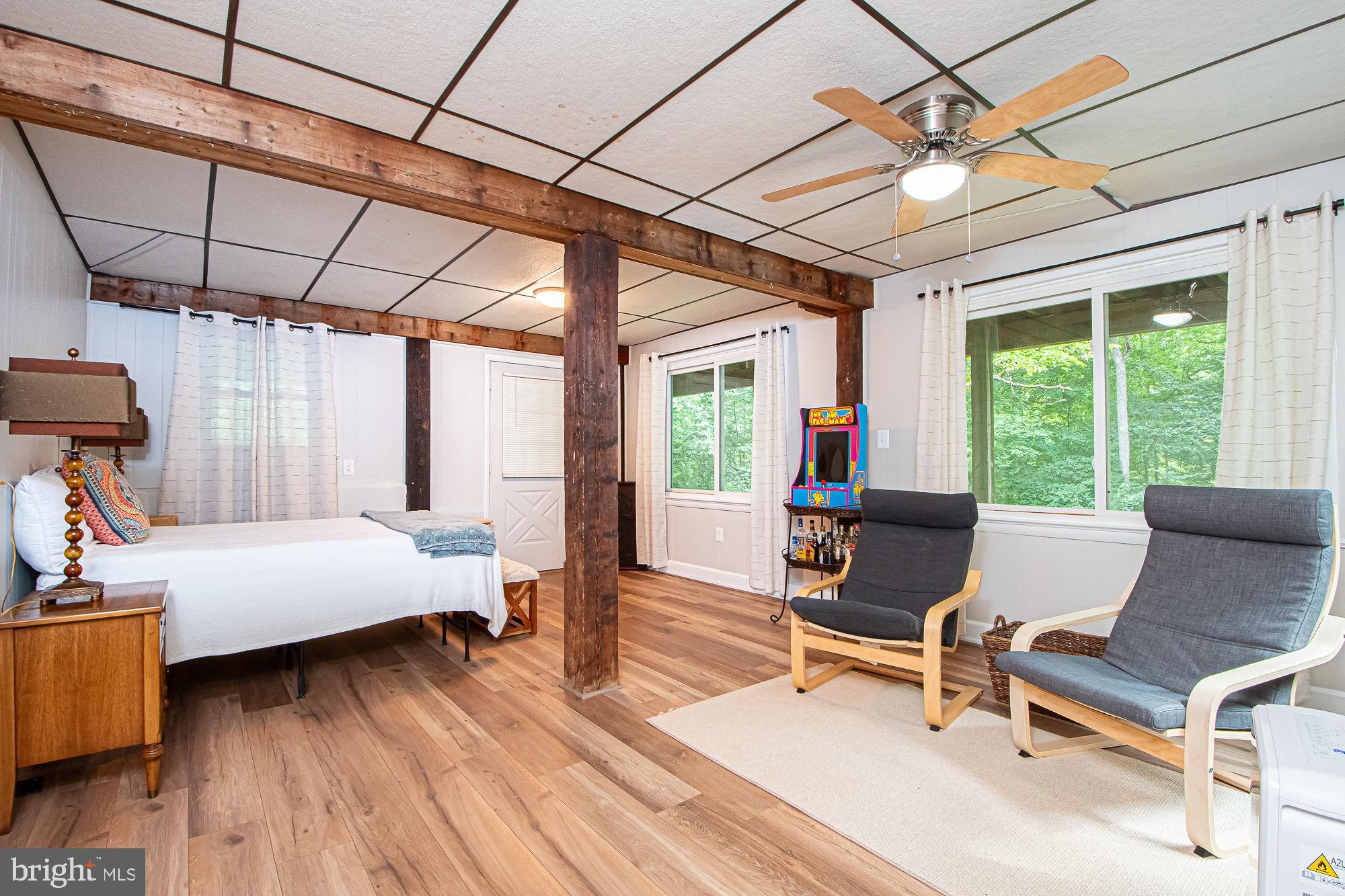 61 Mt Marshall Road Washington, VA 22747 - Photo 35 of 54 a living room with furniture and a wooden floor