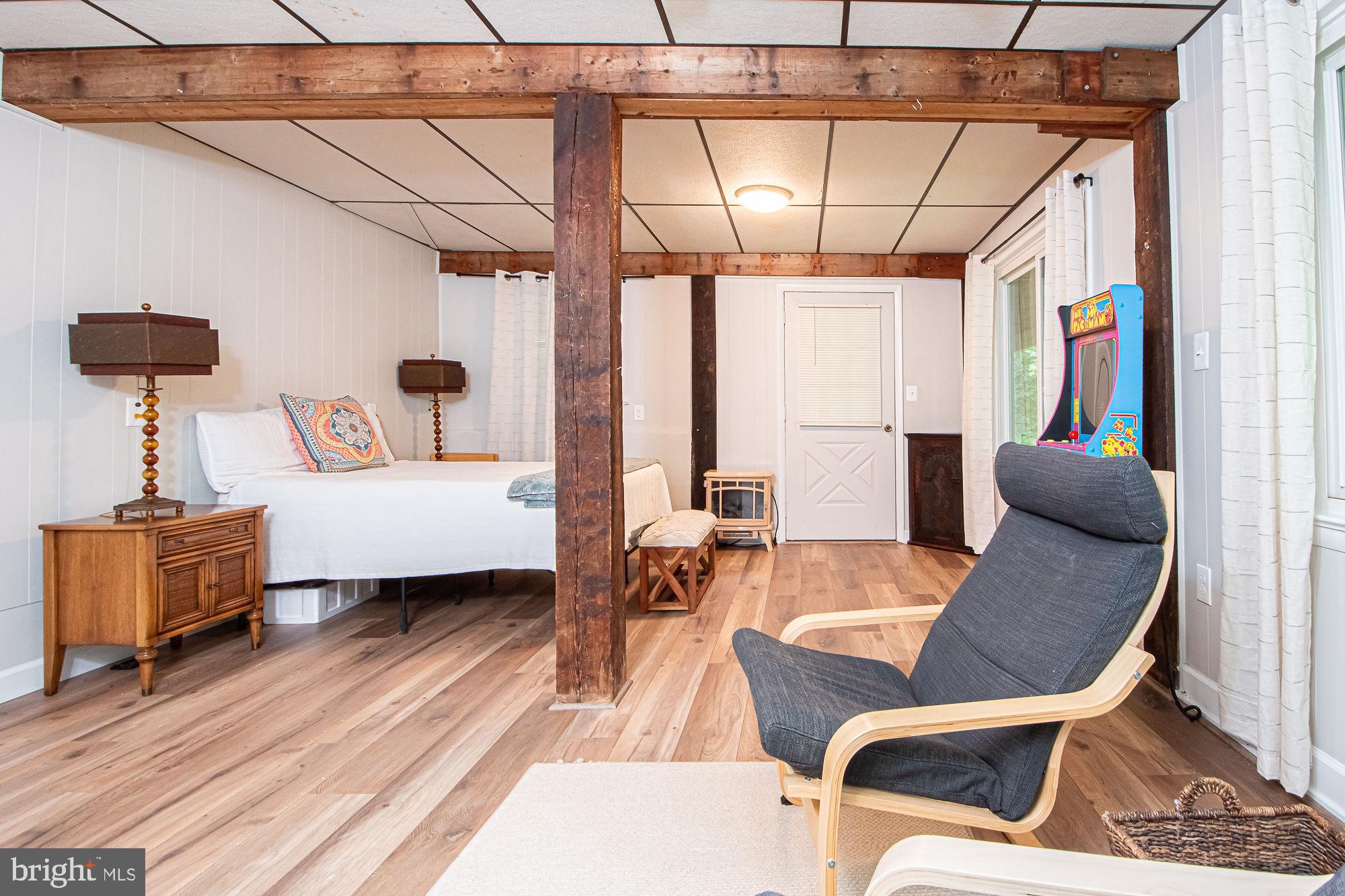 61 Mt Marshall Road Washington, VA 22747 - Photo 39 of 54 a living room with furniture and a wooden floor