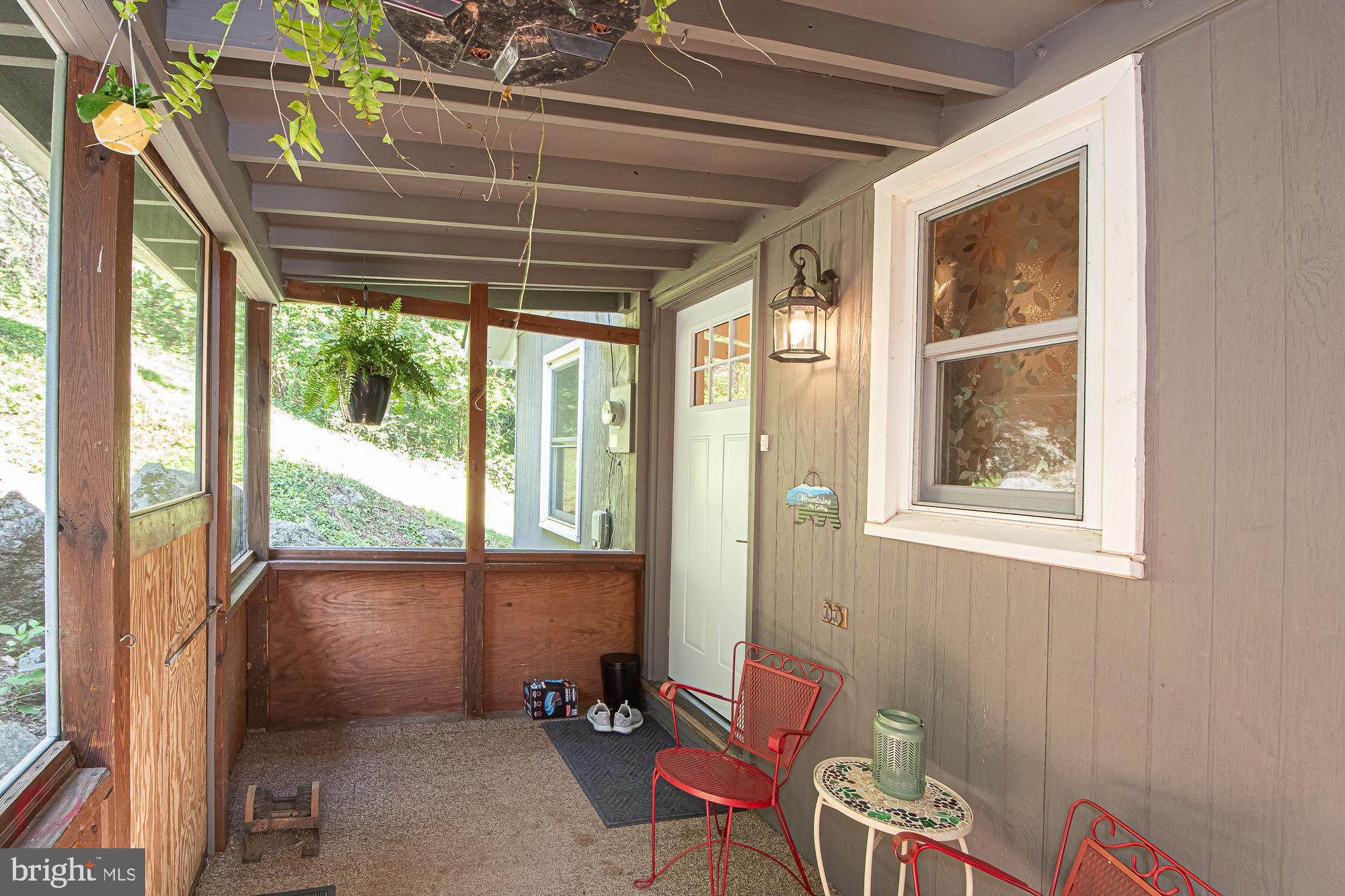 61 Mt Marshall Road Washington, VA 22747 - Photo 4 of 54 a view of a room with furniture and windows