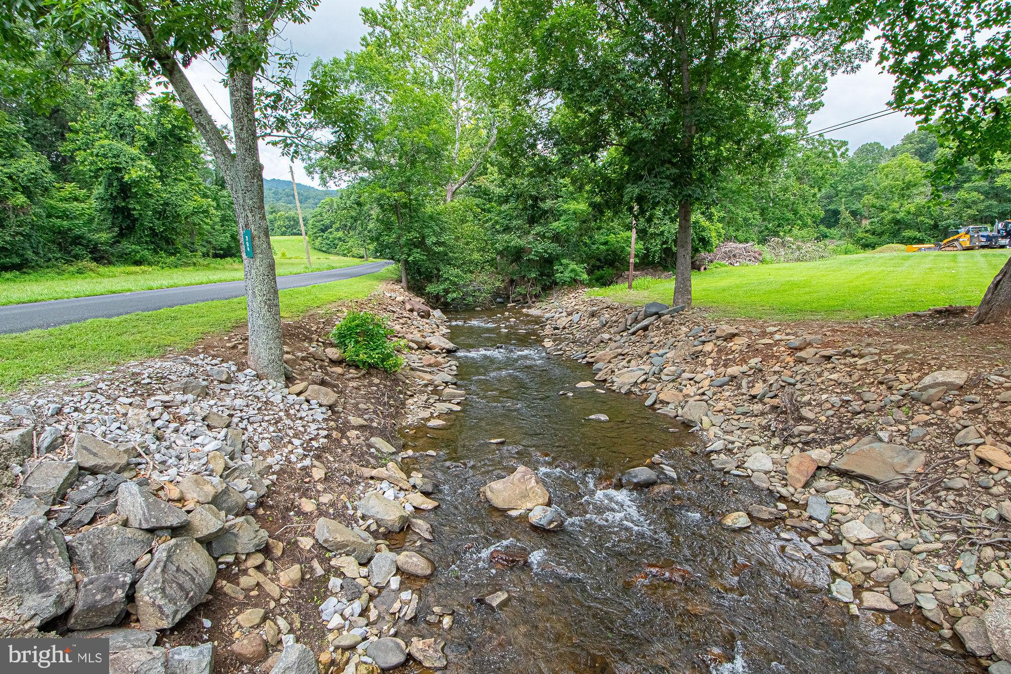 61 Mt Marshall Road Washington, VA 22747 - Photo 52 of 54 a backyard of a house with lots of green space