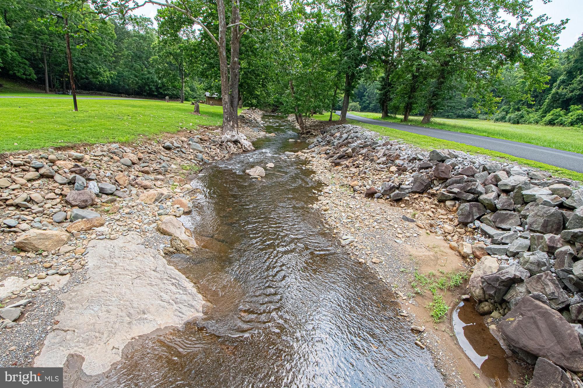 61 Mt Marshall Road Washington, VA 22747 - Photo 53 of 54 a view of a golf course with a lake