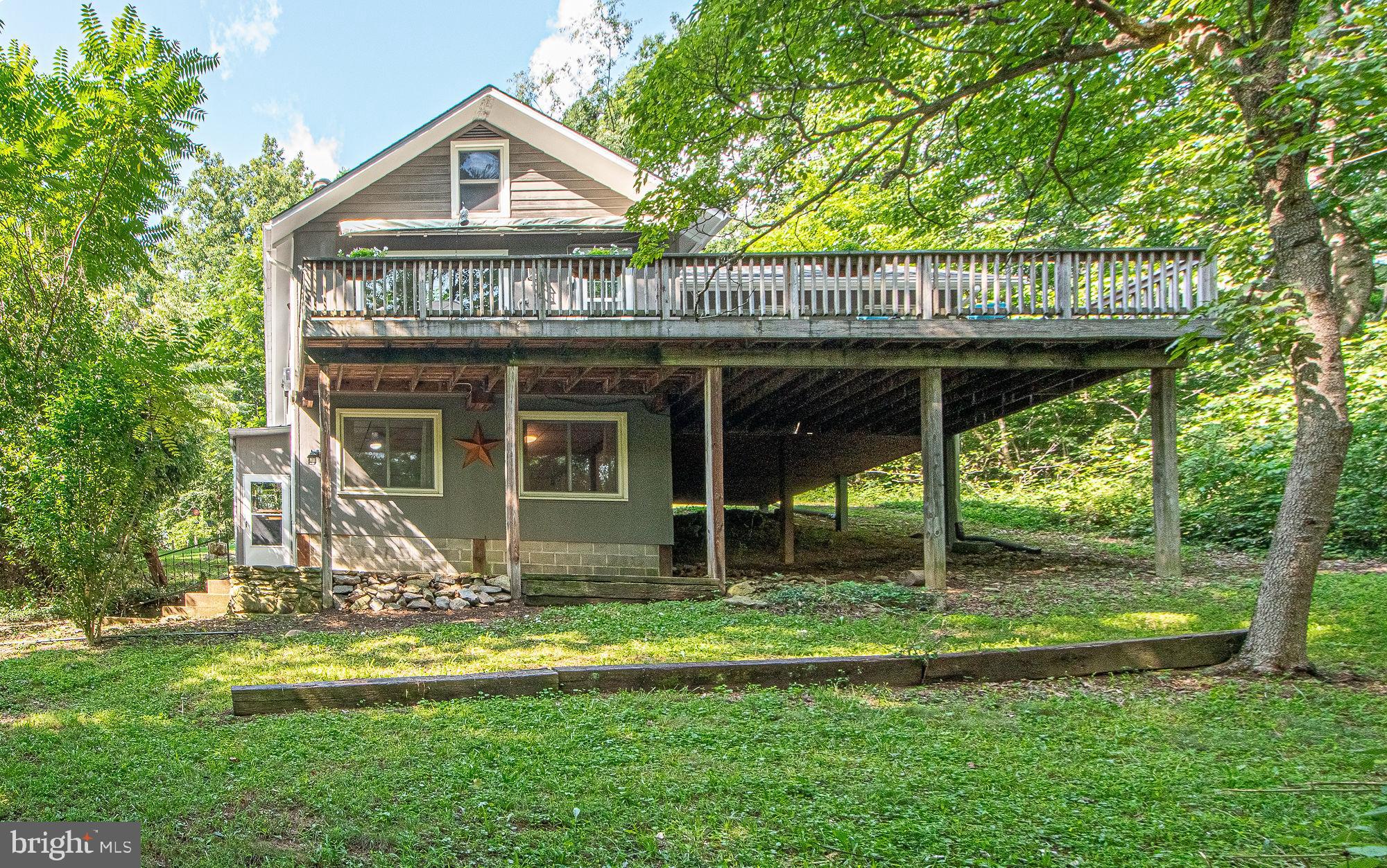 61 Mt Marshall Road Washington, VA 22747 - Photo 54 of 54 a view of a house with a yard balcony and sitting area
