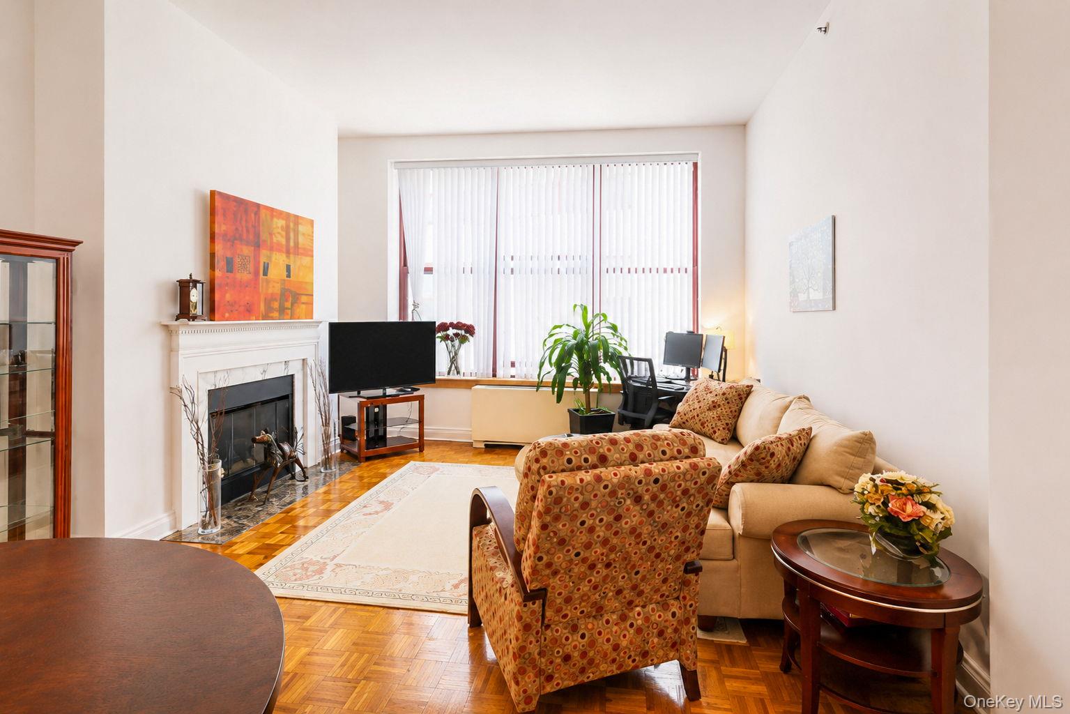 1 Scarsdale Road, Unit 409 Tuckahoe, NY 10707 - Photo 7 of 42 Living room with gas fireplace