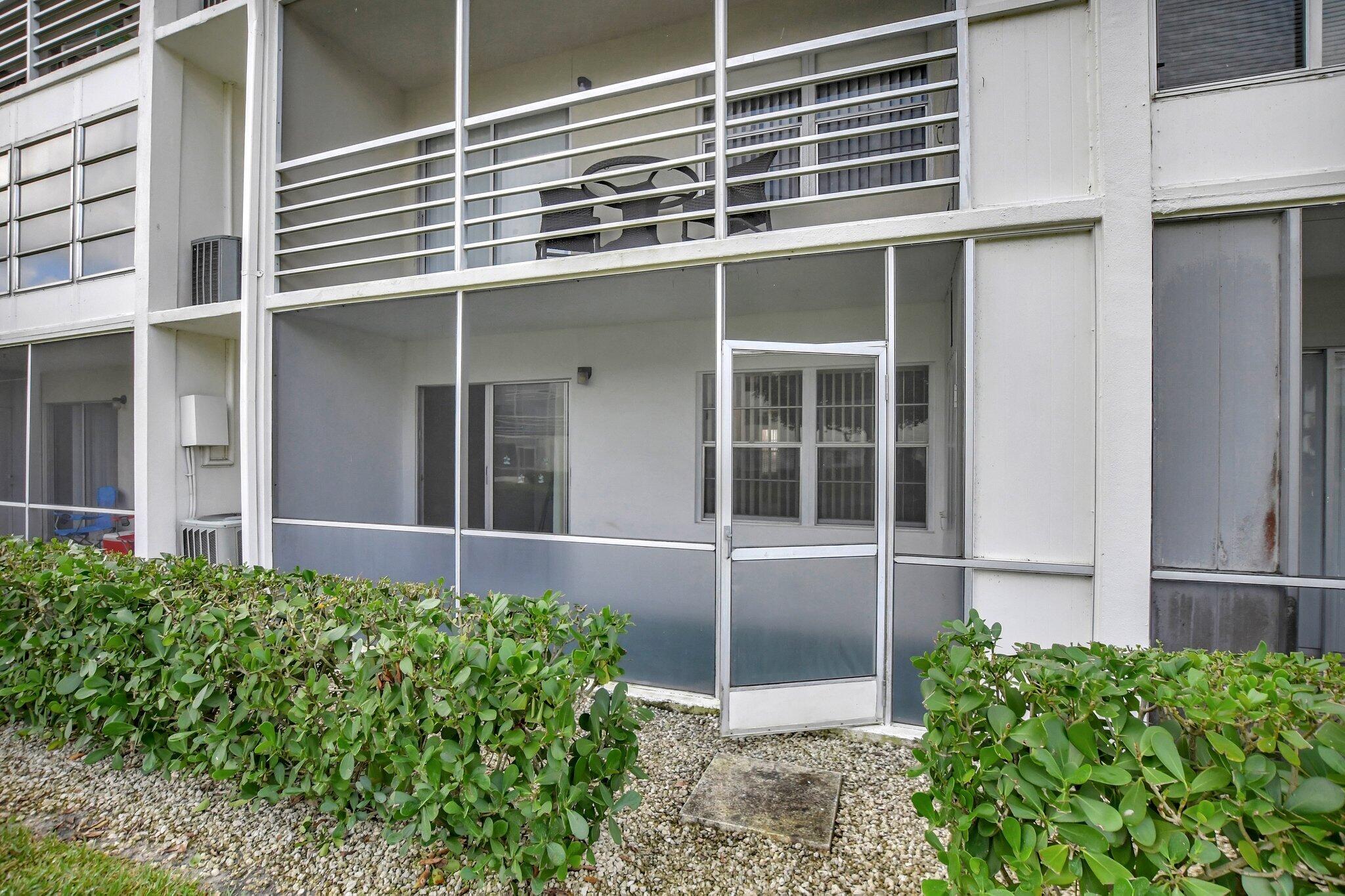 296 Fanshaw H Boca Raton, FL 33434 - Photo 4 of 74 Back of Condo