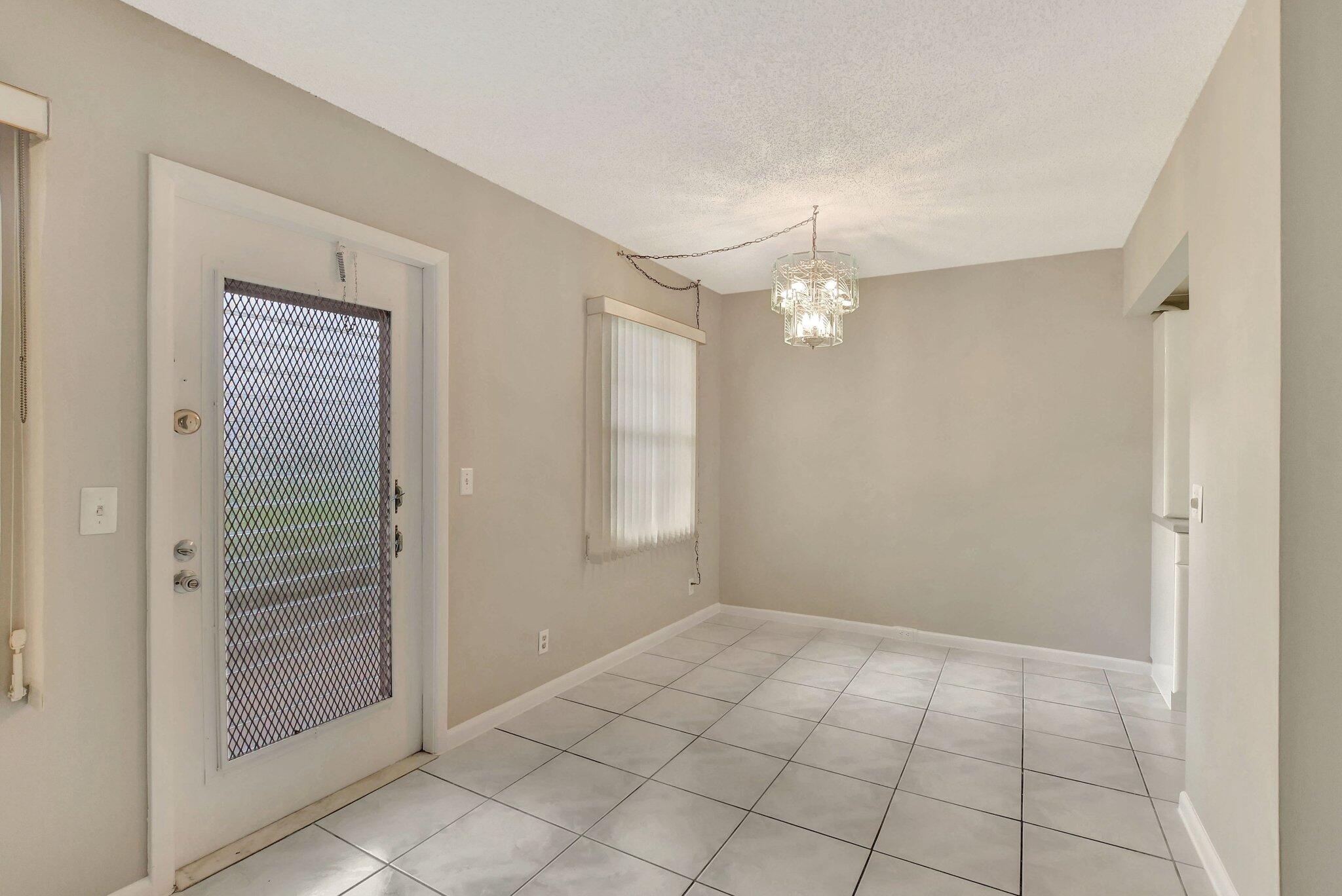 296 Fanshaw H Boca Raton, FL 33434 - Photo 10 of 74 Dining Area