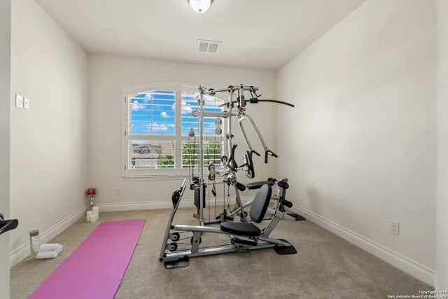 a view of a room with gym equipment