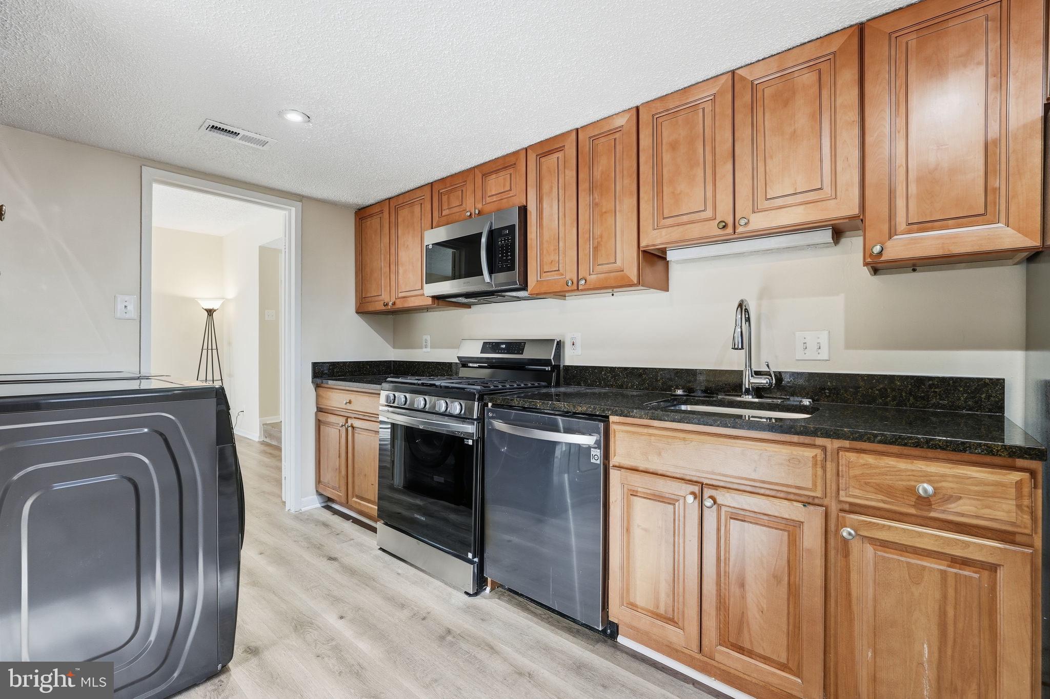 11807 Breton Court, Unit 2B Reston, VA 20191 - Photo 12 of 30 Brand new stainless steel appliances.