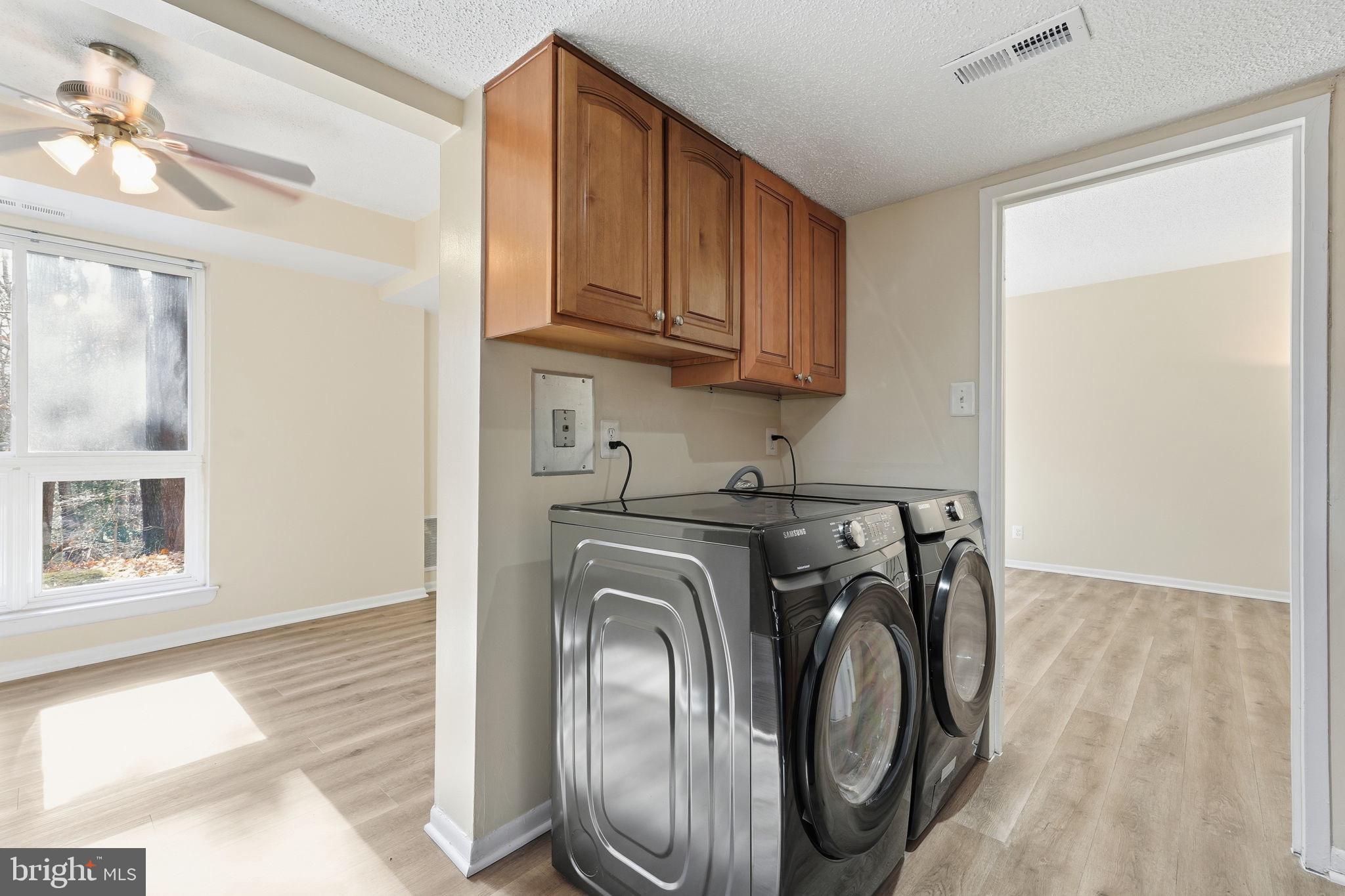 11807 Breton Court, Unit 2B Reston, VA 20191 - Photo 13 of 30 Full-size washer and dryer.