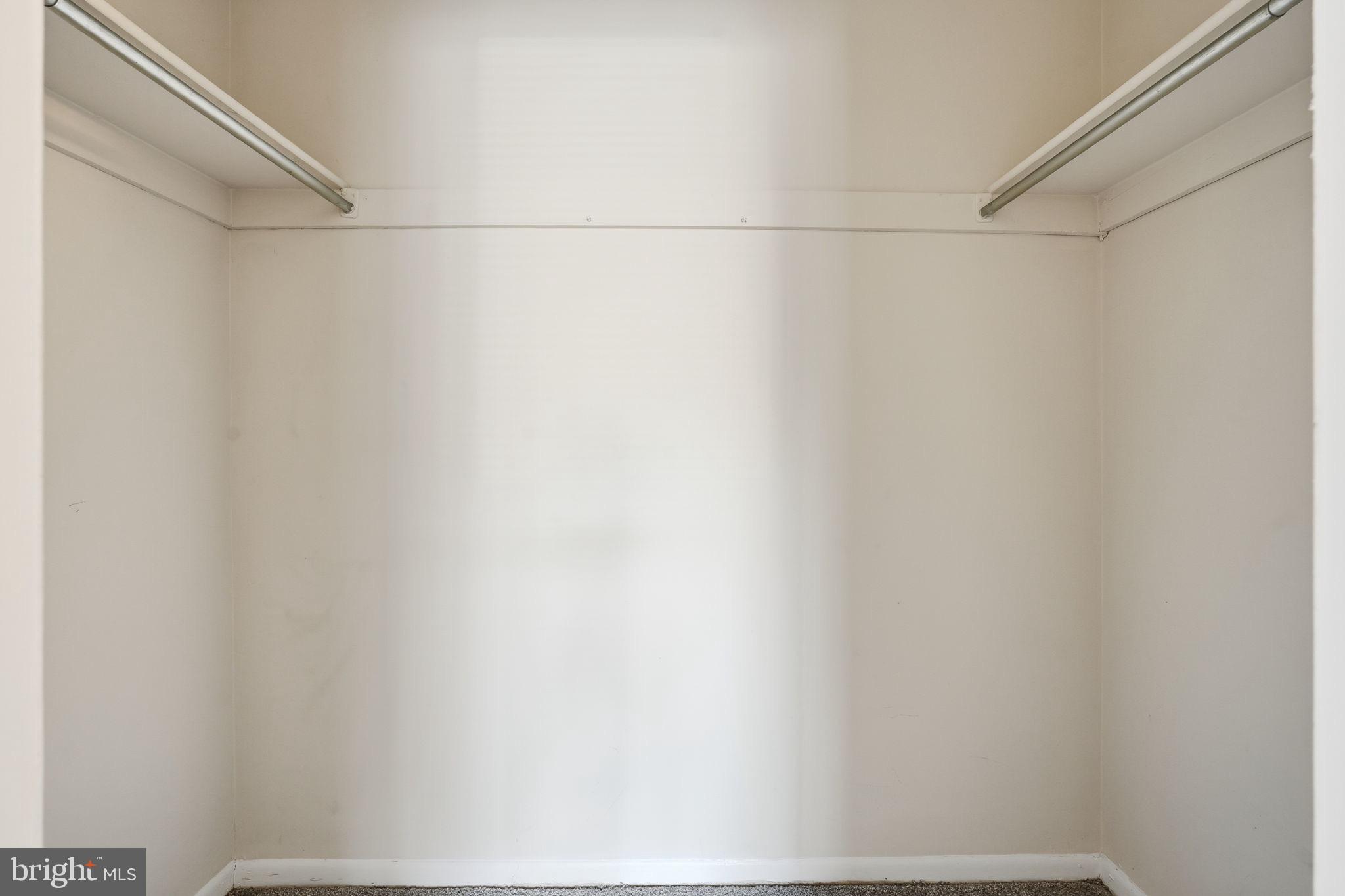 11807 Breton Court, Unit 2B Reston, VA 20191 - Photo 18 of 30 Primary walk-in closet.