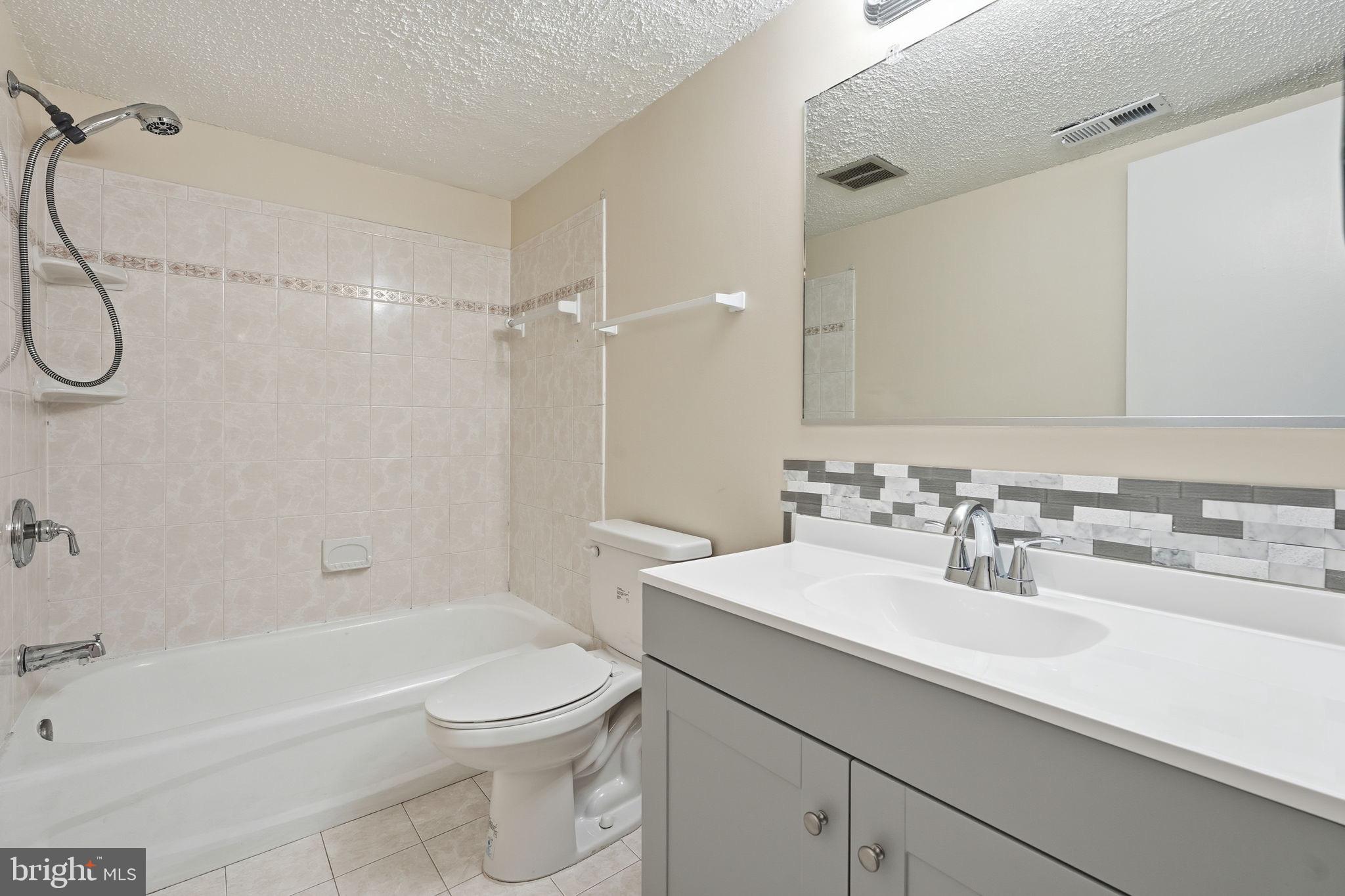 11807 Breton Court, Unit 2B Reston, VA 20191 - Photo 19 of 30 Updated bathroom with new vanity.