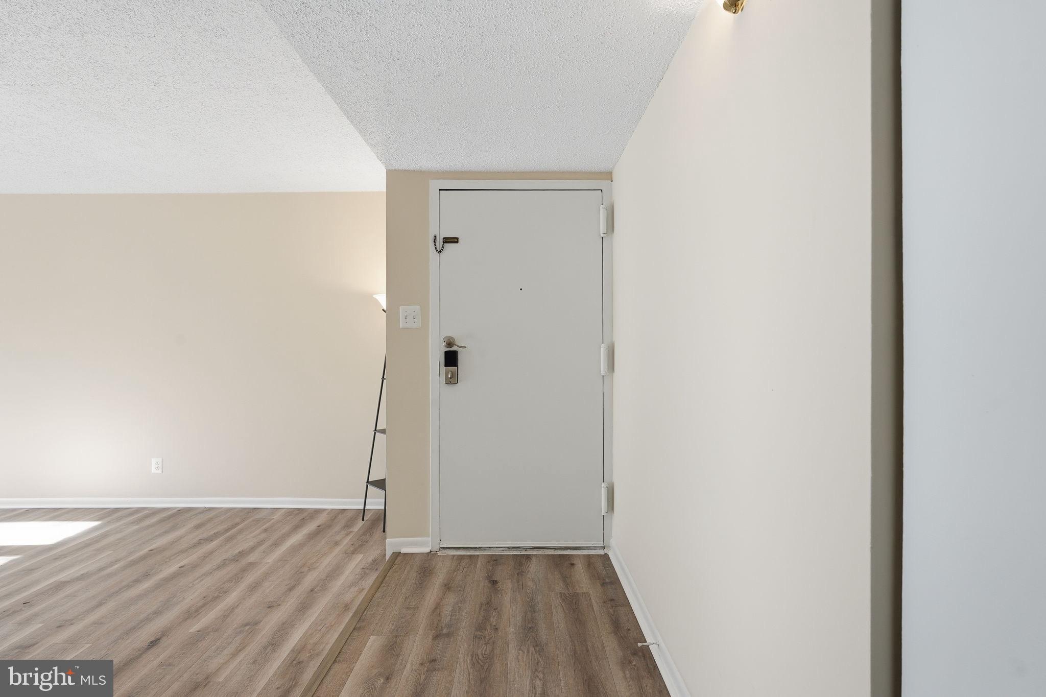 11807 Breton Court, Unit 2B Reston, VA 20191 - Photo 2 of 30 Welcoming entryway with modern charm.