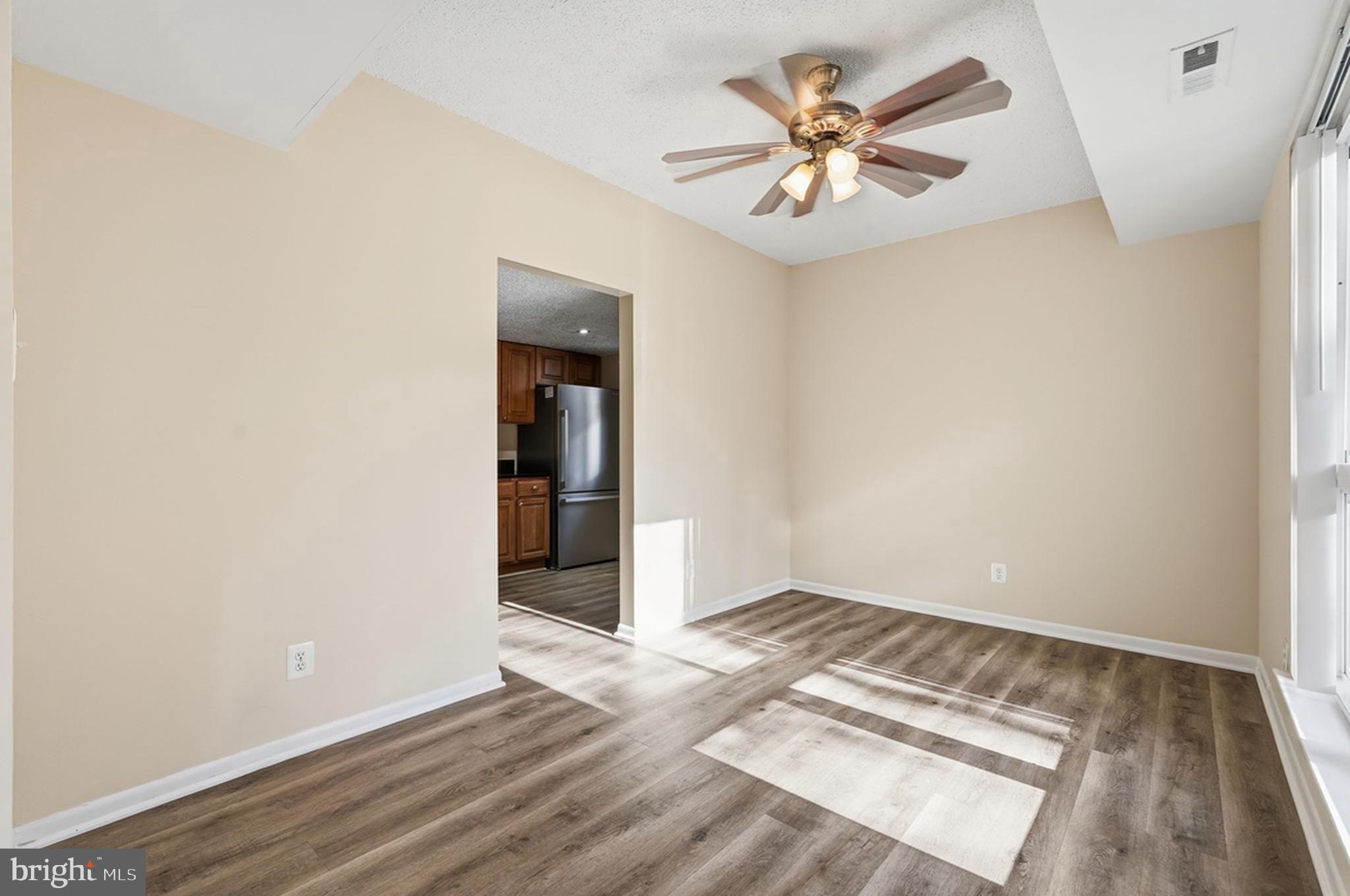 11807 Breton Court, Unit 2B Reston, VA 20191 - Photo 7 of 30 Bright and airy dining area.