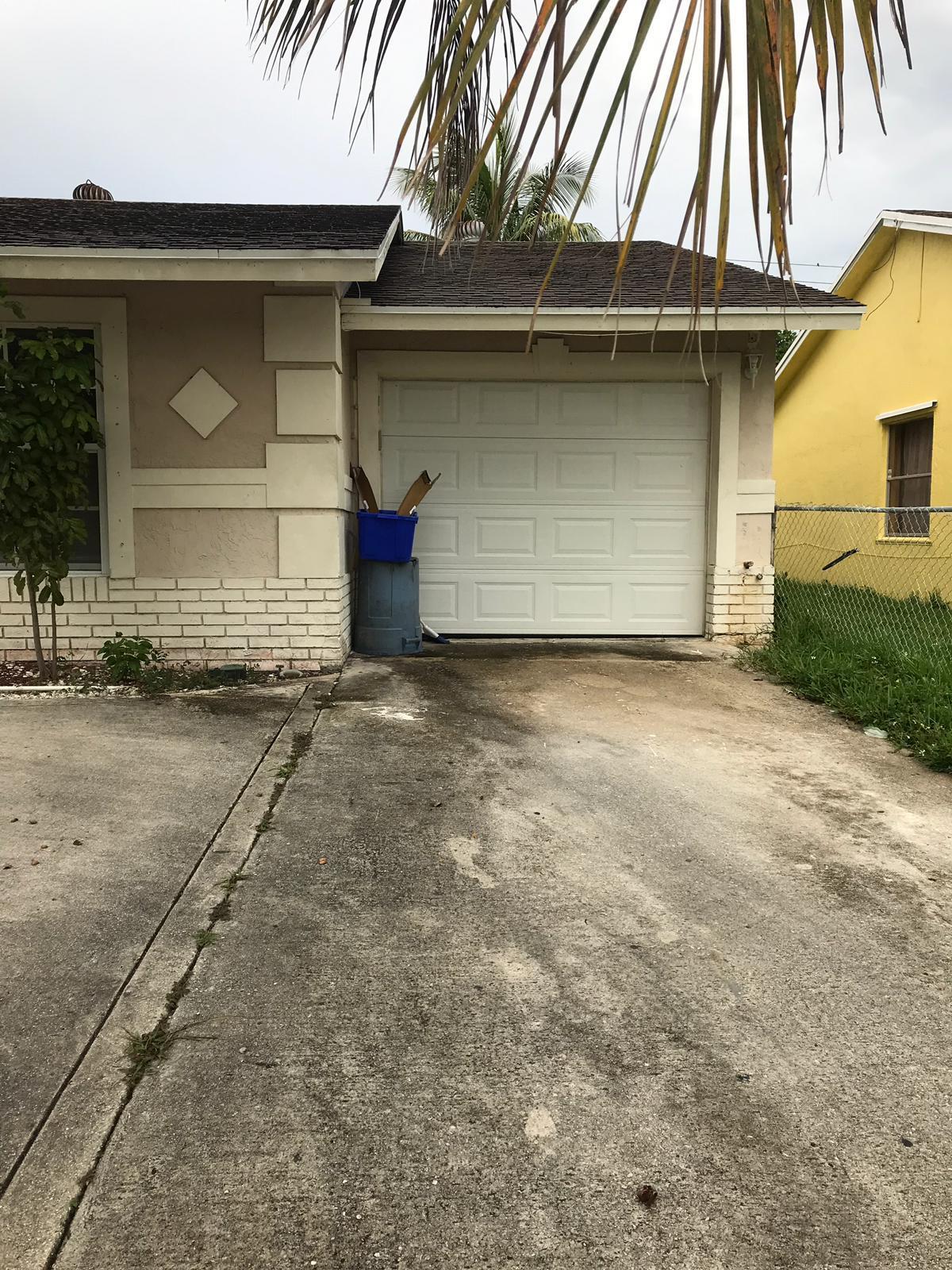 6057 Westfall Road Lake Worth, FL 33463 - Photo 4 of 16 front