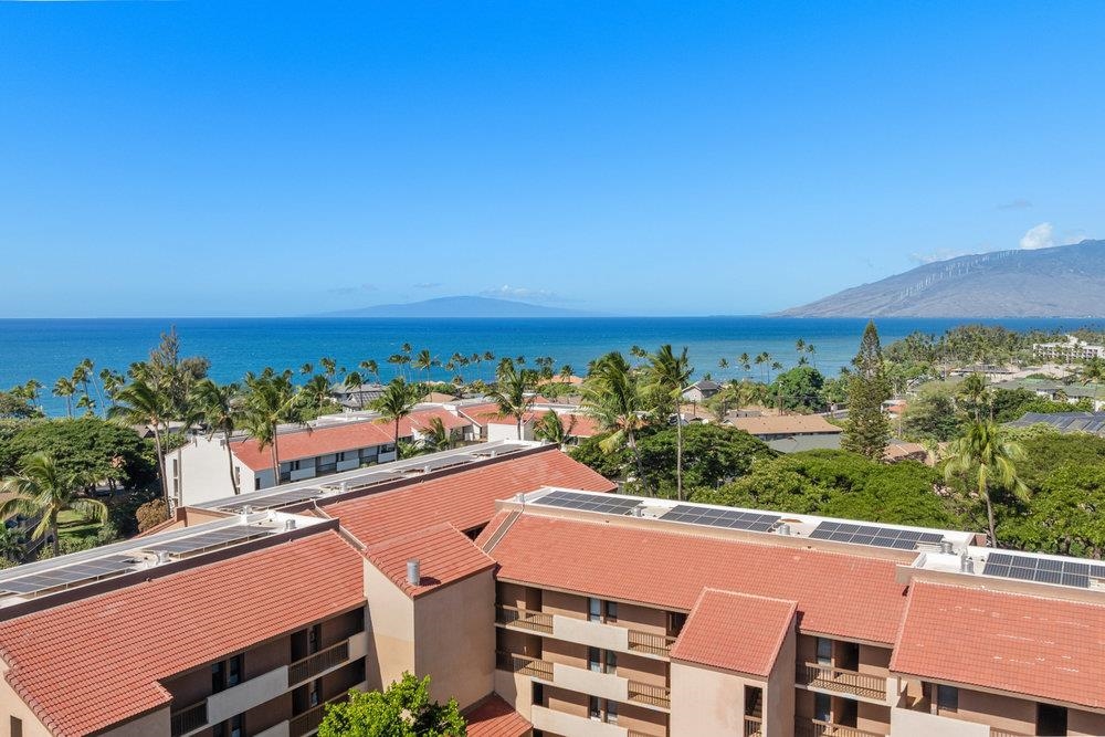 2191 South Kihei Road, Unit 2413 Kihei, HI 96753 - Photo 28 of 32 an aerial view of residential houses with outdoor space and trees