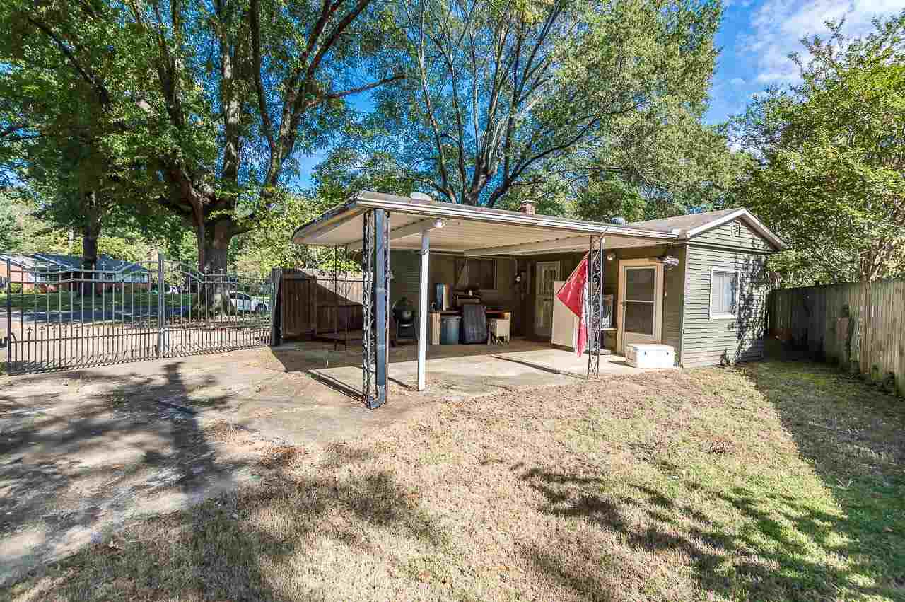 5093 Dee Road Memphis, TN 38117 - Photo 21 of 21 a view of a house with a yard and sitting area
