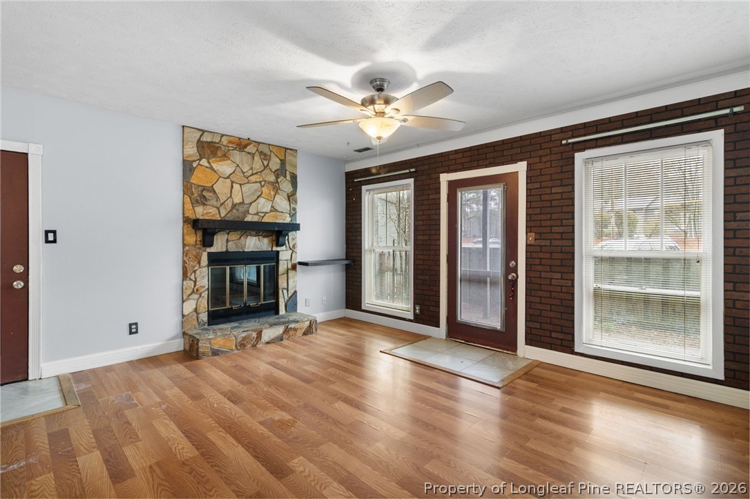 1908 Tryon Drive, Unit 1 Fayetteville, NC 28303 - Photo 5 of 29 wooden floor in an empty room with a window