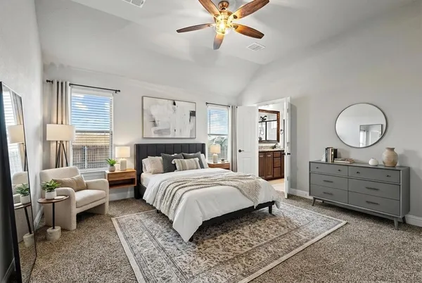 a bedroom with a bed and window