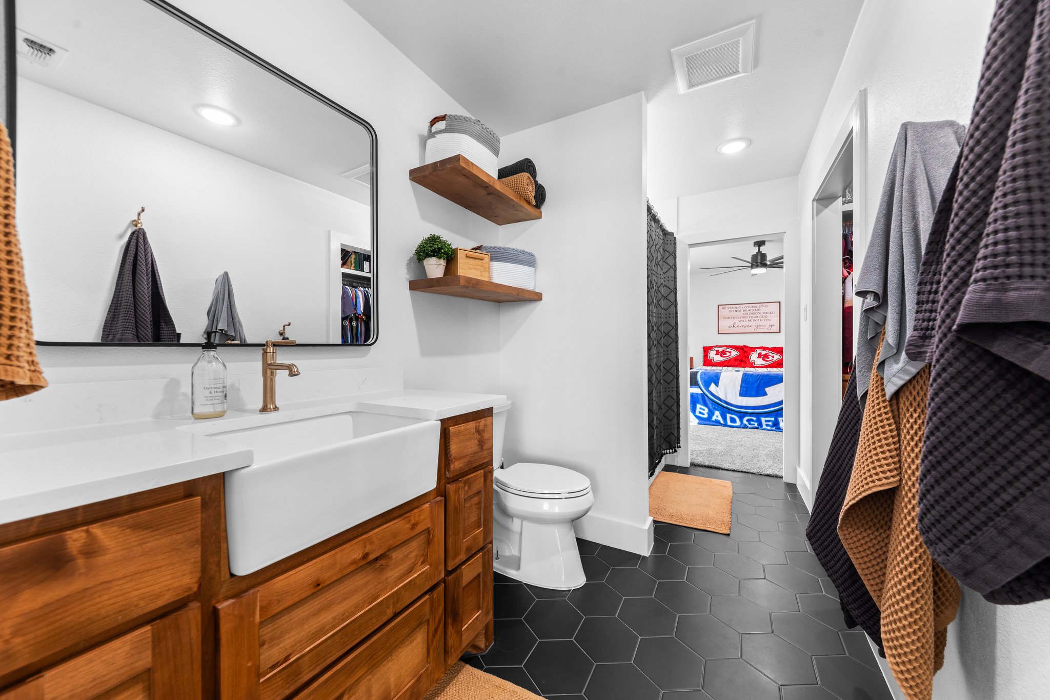 1800 Diamond Ridge Drive Lampasas, TX 76550 - Photo 21 of 40 Ensuite bathroom with vanity, dark tile patterned flooring, and recessed lighting